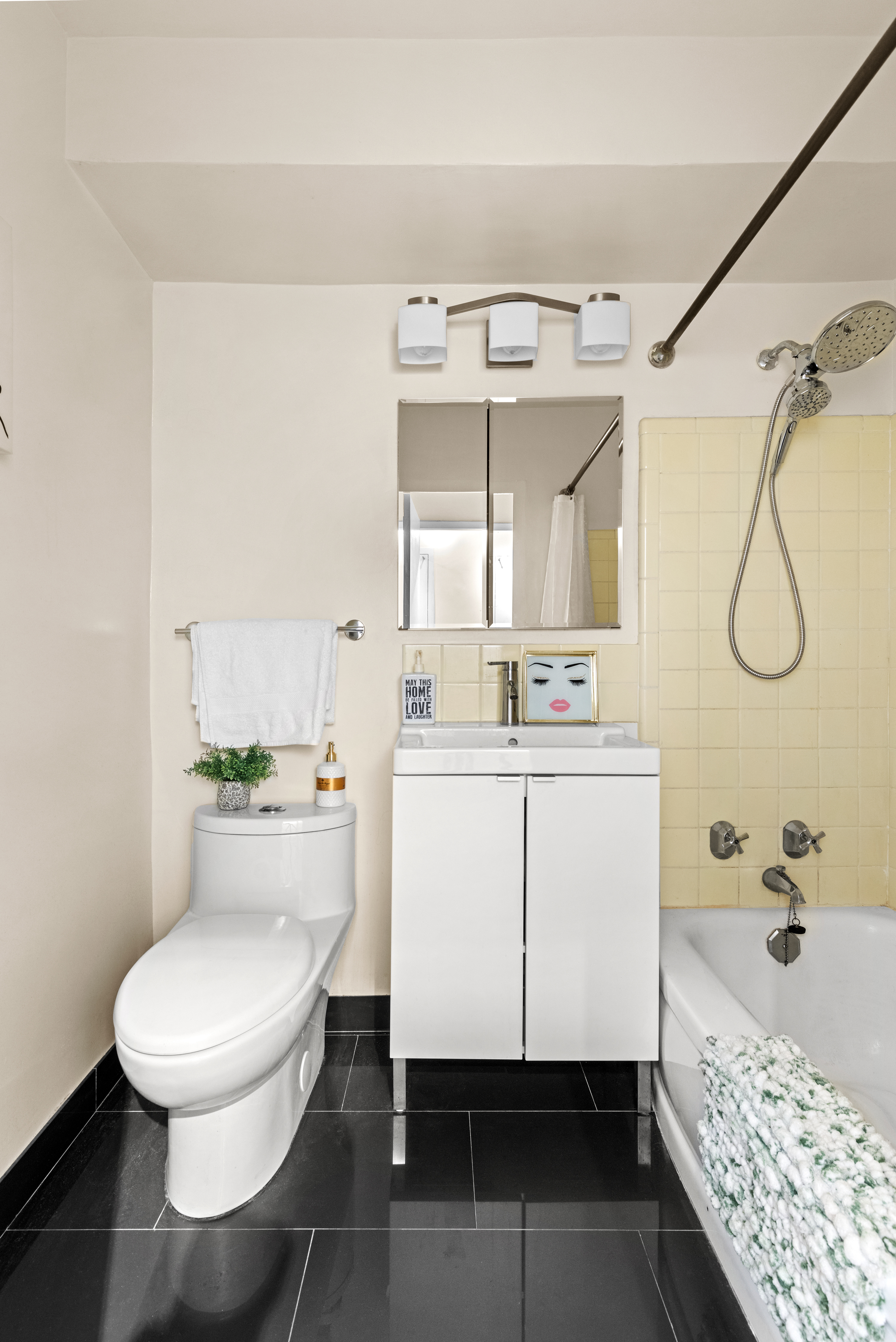 90 La Salle Street, Unit 8E Manhattan, NY 10027 - Photo 5 of 8 a bathroom with a sink toilet and shower
