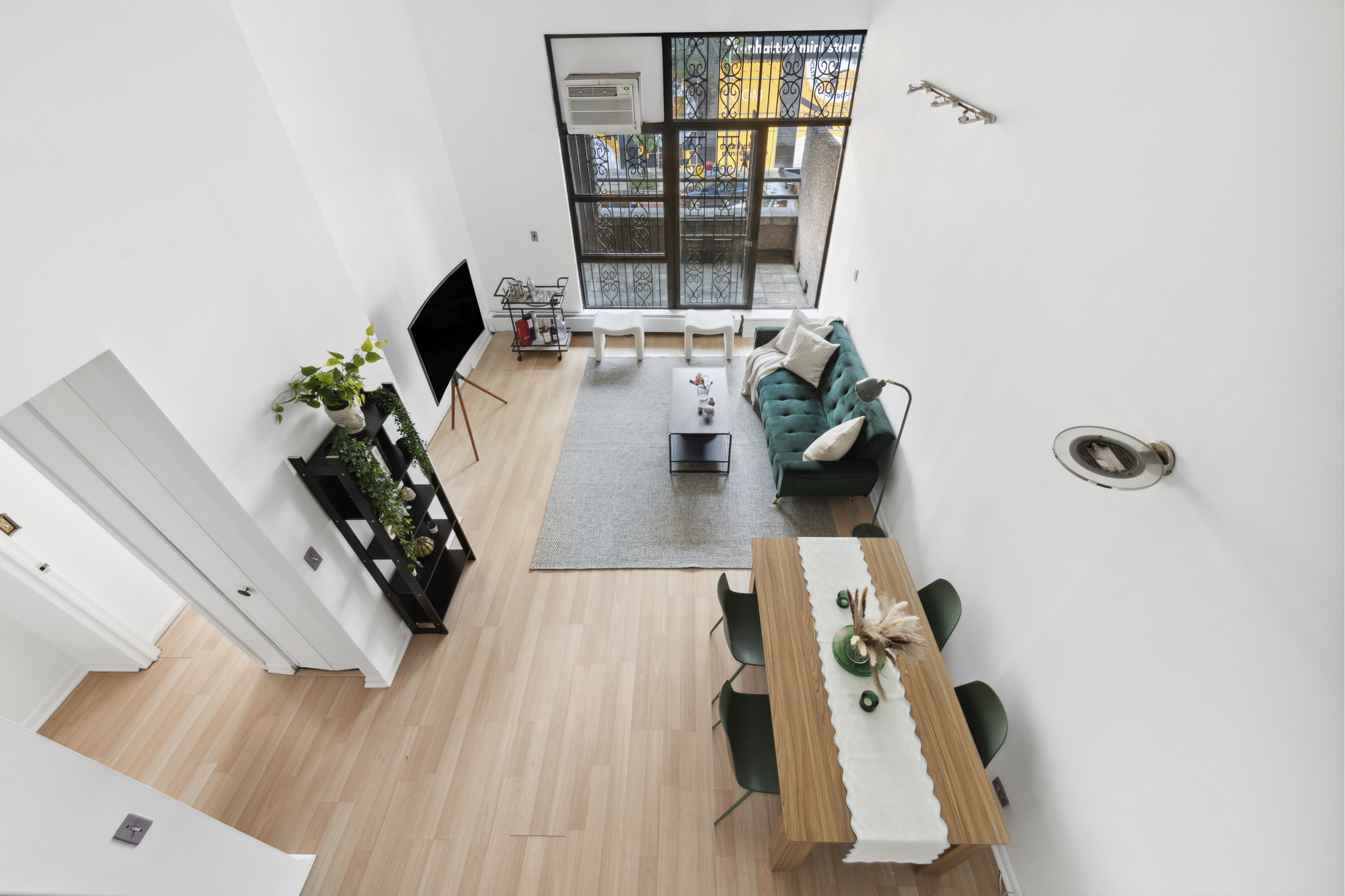 350 East 62nd Street, Unit 2B Manhattan, NY 10065 - Photo 7 of 10 a view of living room with furniture and window