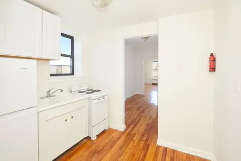 a room with a sink and a cabinets