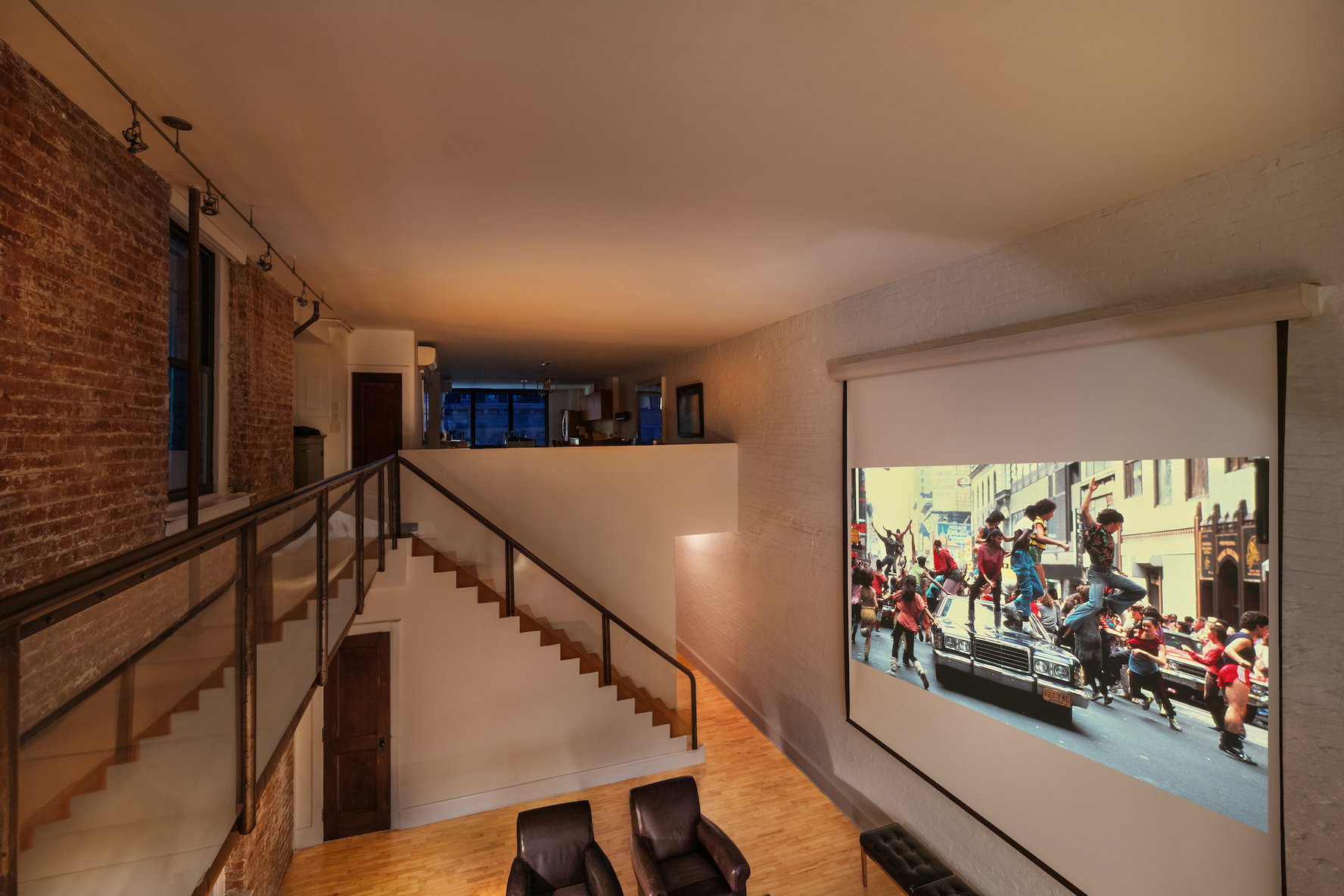 131 West 24th Street, Unit 5/6 Manhattan, NY 10011 - Photo 3 of 14 a view of a room with wooden floor and windows