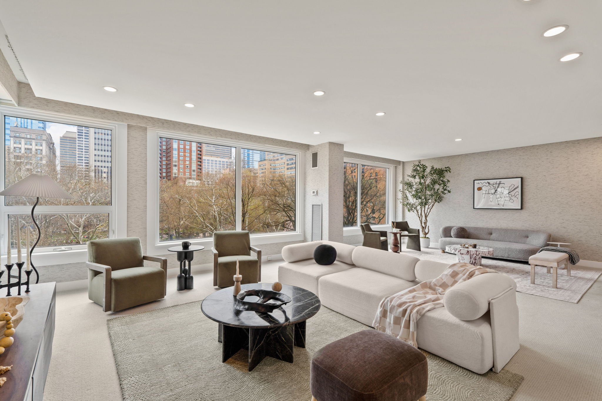 1820 Rittenhouse Square, Unit 601 Philadelphia, PA 19103 - Photo 1 of 4 a living room with furniture and a large window