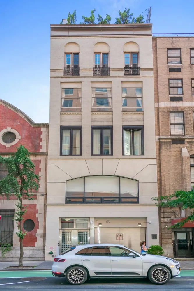 a car parked in front of a building