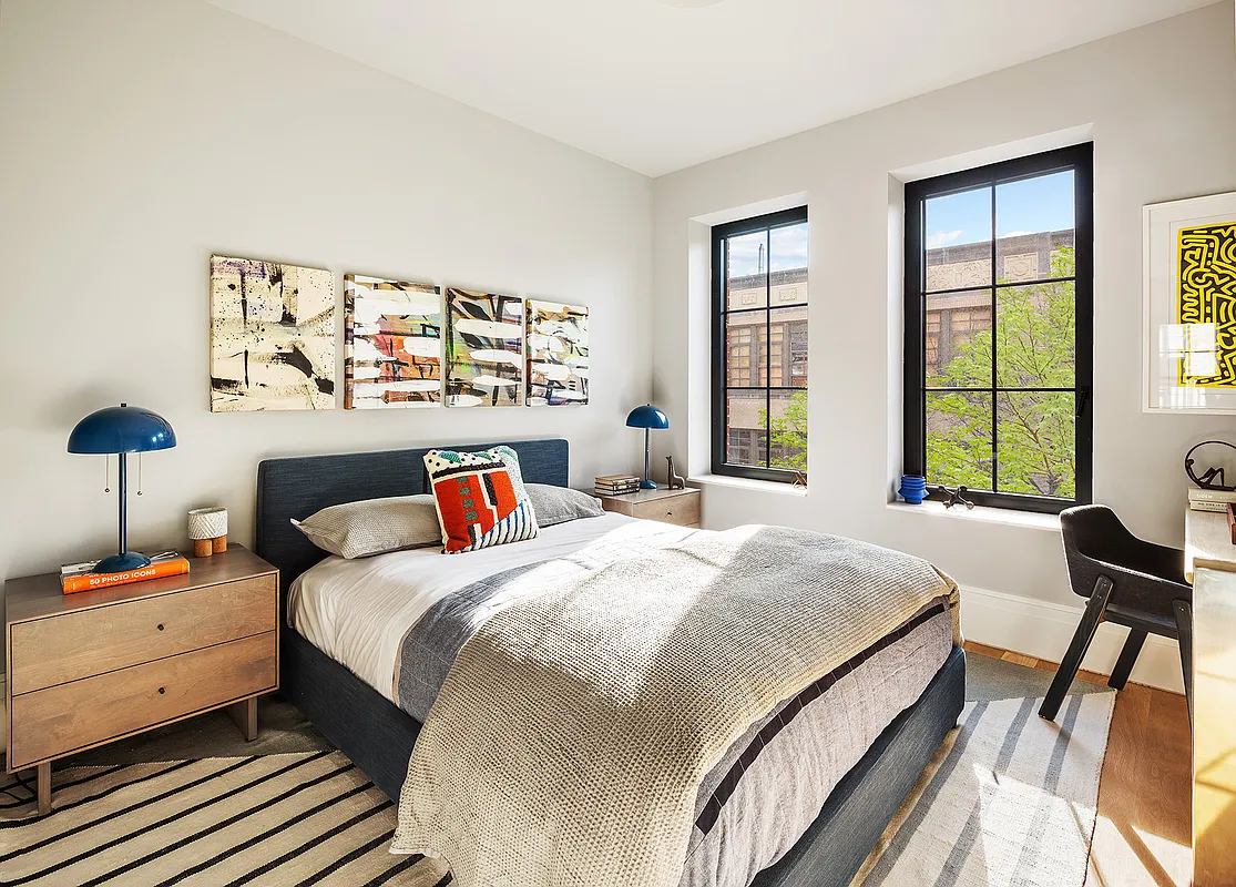 537 Pacific Street Brooklyn, NY 11217 - Photo 20 of 25 a bedroom with a bed and a window