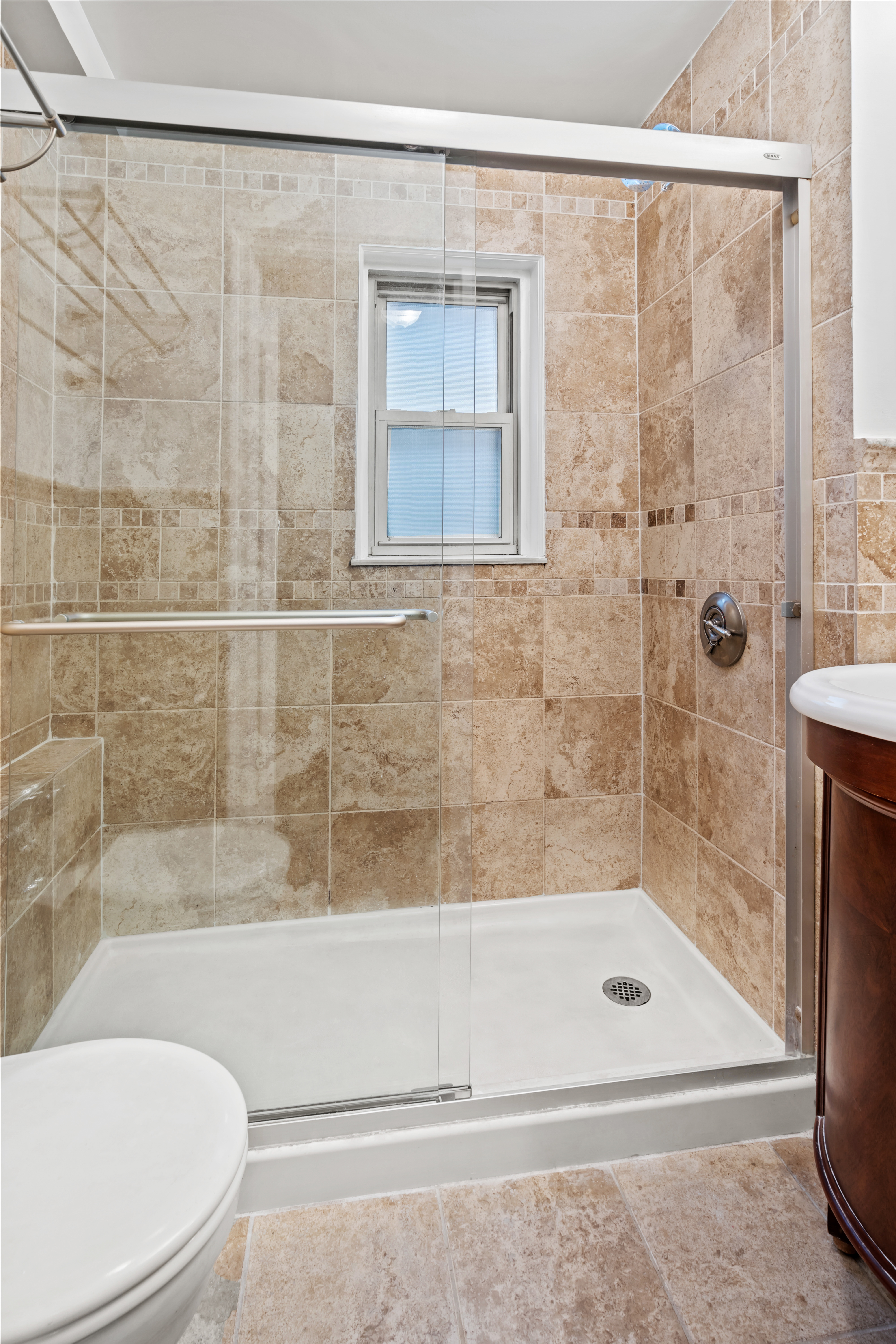 155 East 49th Street, Unit 8C Manhattan, NY 10017 - Photo 8 of 10 a bathroom with a shower and a bathtub