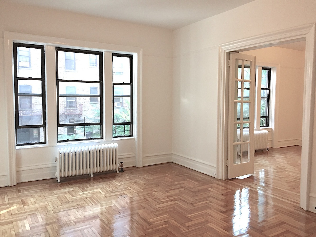 a view of an empty room and window