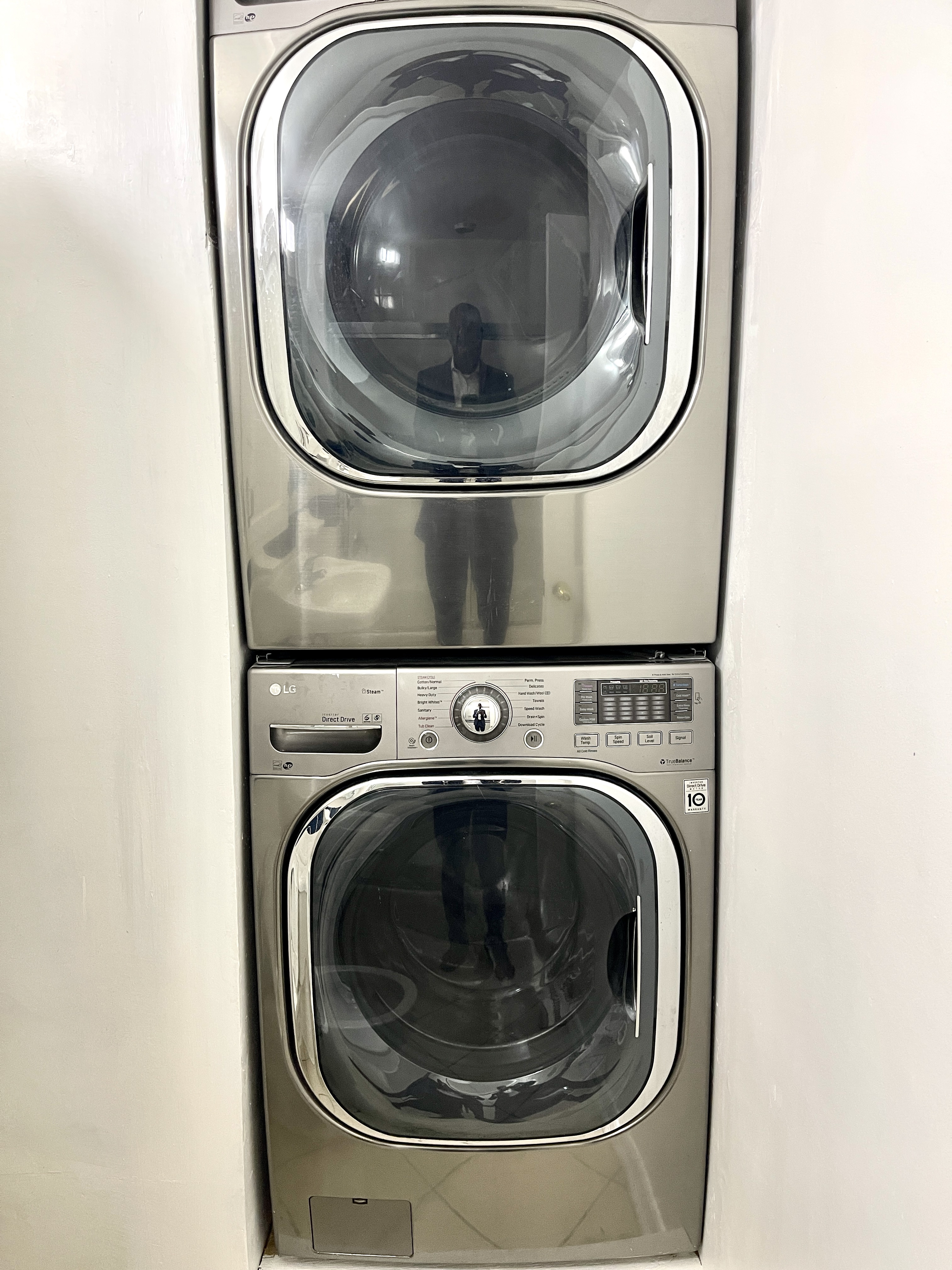 148A Madison Street, Unit 4 Manhattan, NY 10002 - Photo 13 of 13 a close up view of a washer and dryer
