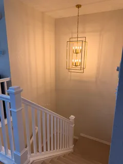 a view of a hallway with windows