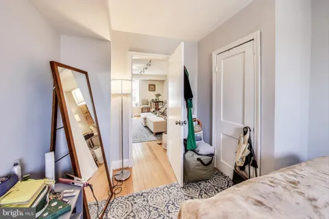 a bed room with a bed and furniture