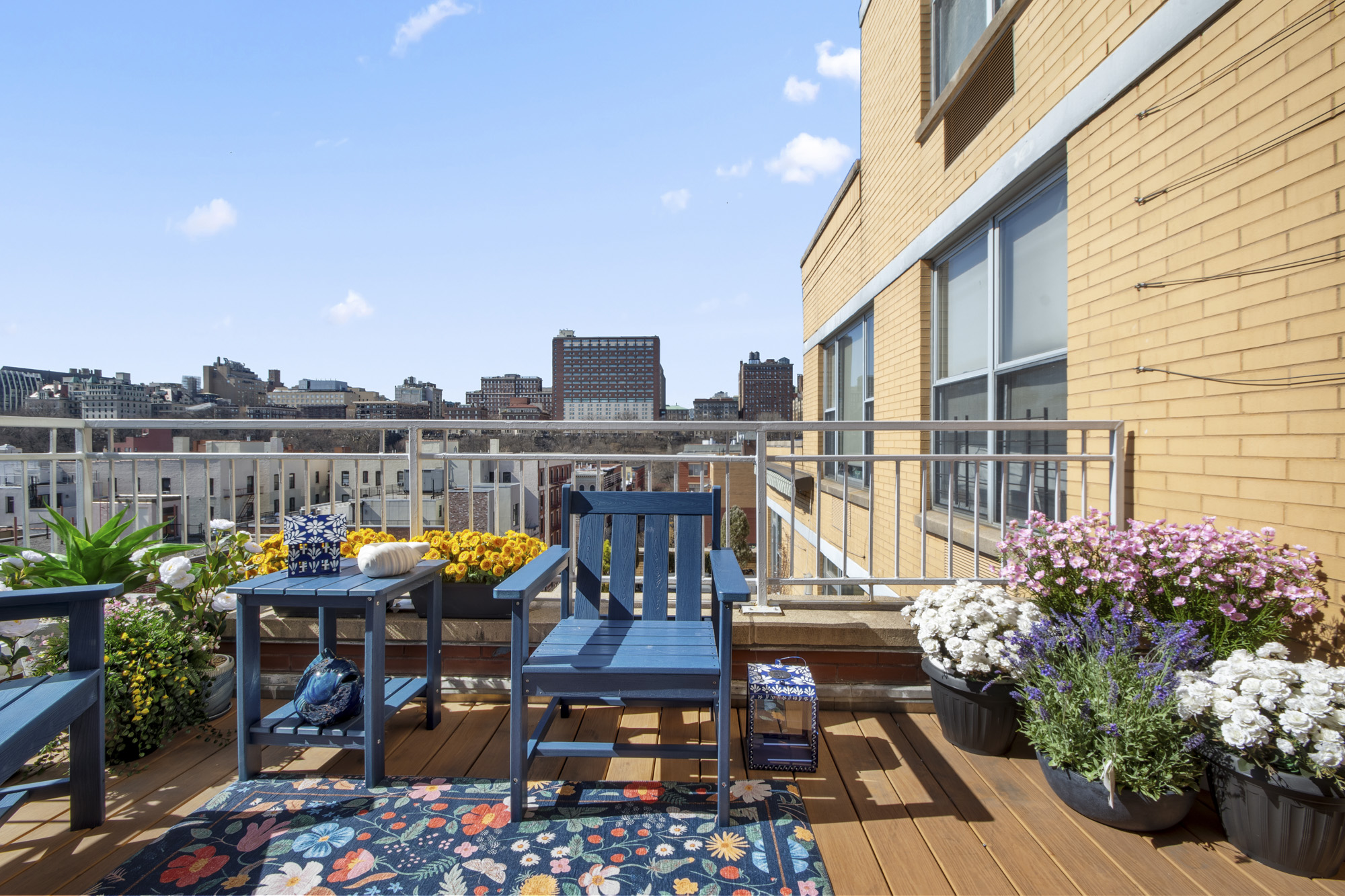 301 West 118th Street, Unit PH1F Manhattan, NY 10026 - Photo 3 of 15 a view of a patio with chairs and potted plants