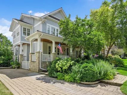 a view of a chairs and tables in the balcony