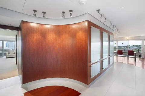 a bathroom with a shower and a sink