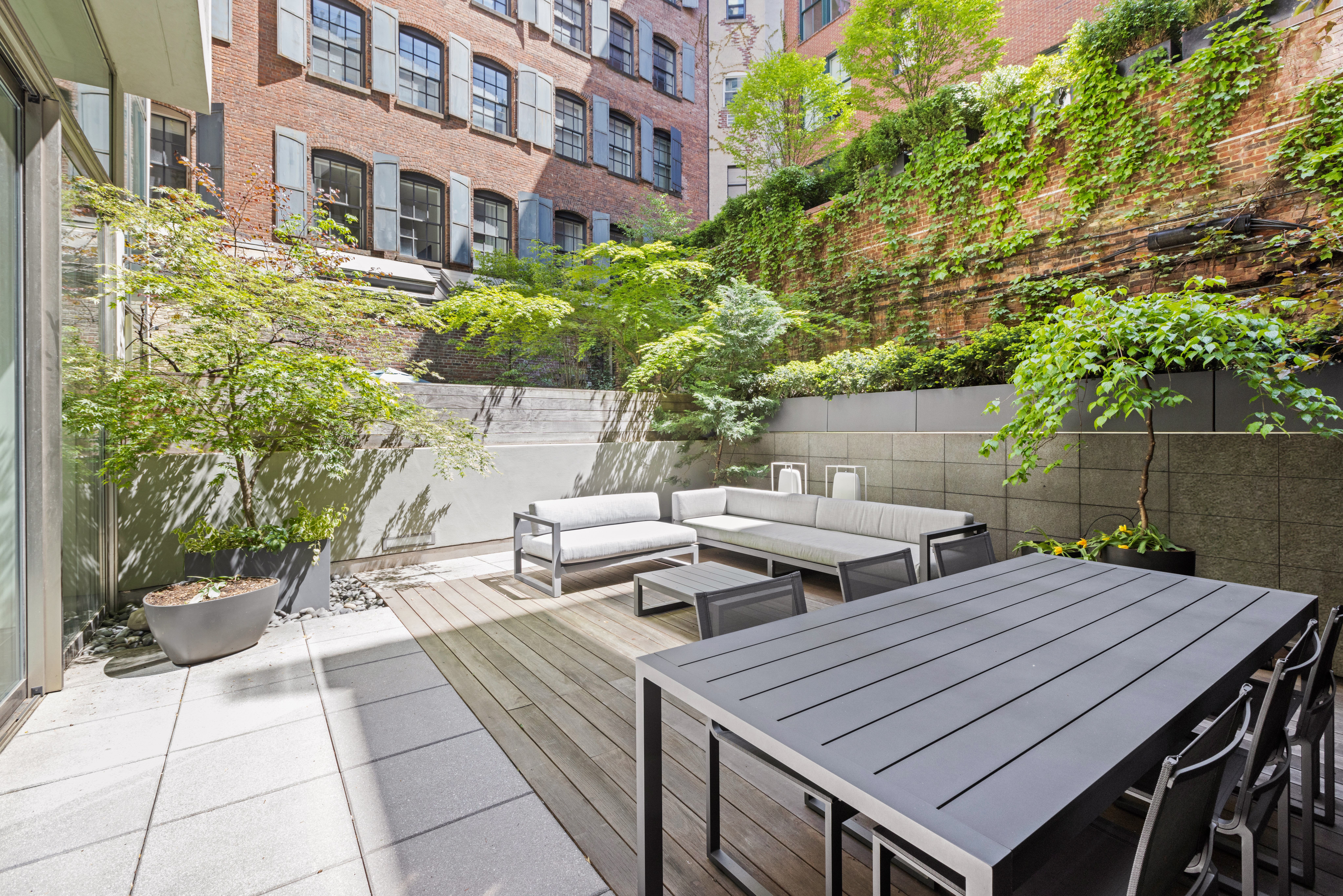 33 Vestry Street, Unit TH1 Manhattan, NY 10013 - Photo 4 of 17 a wooden bench sitting in front of a building