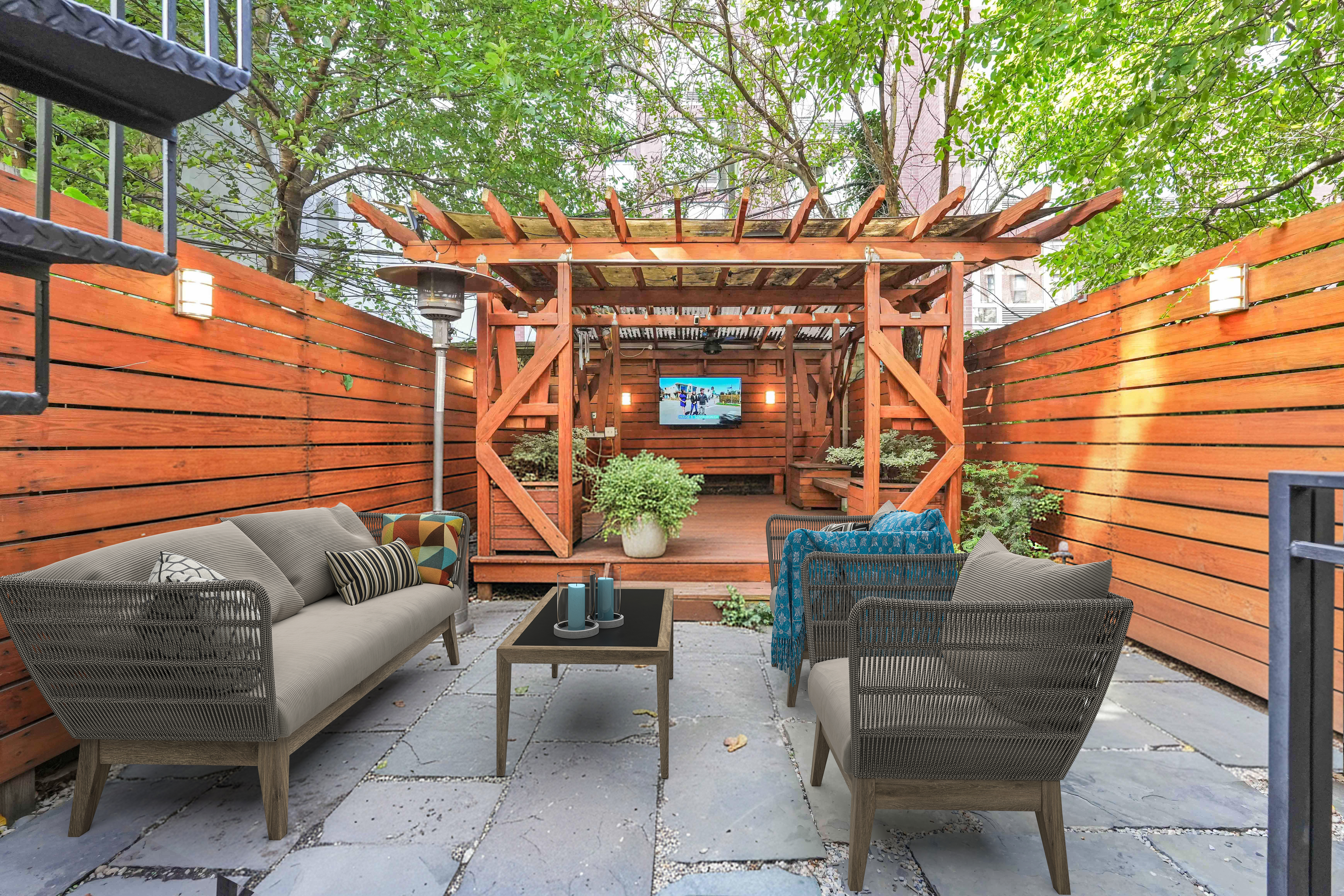 288 St James Place, Unit TRIPLEX Brooklyn, NY 11238 - Photo 8 of 25 a view of a patio with couches and a fire pit