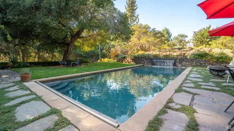 a view of a wooden floor and lake view