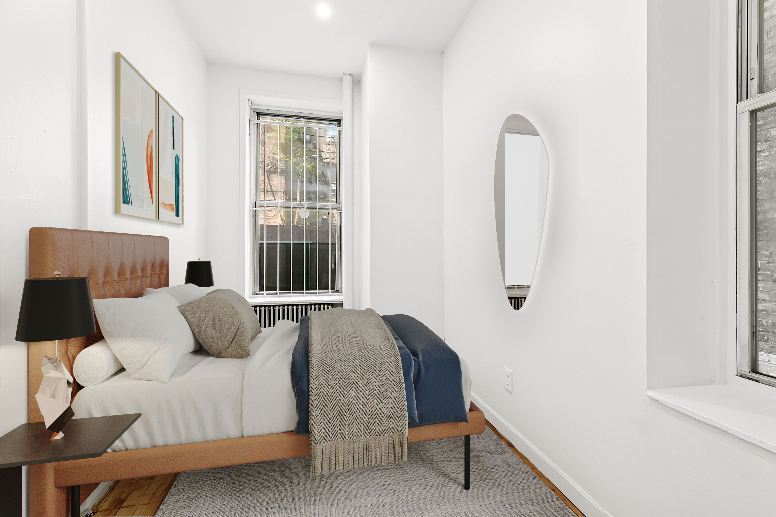 205 West 20th Street, Unit 1A Manhattan, NY 10011 - Photo 5 of 7 a bedroom with bed and a window