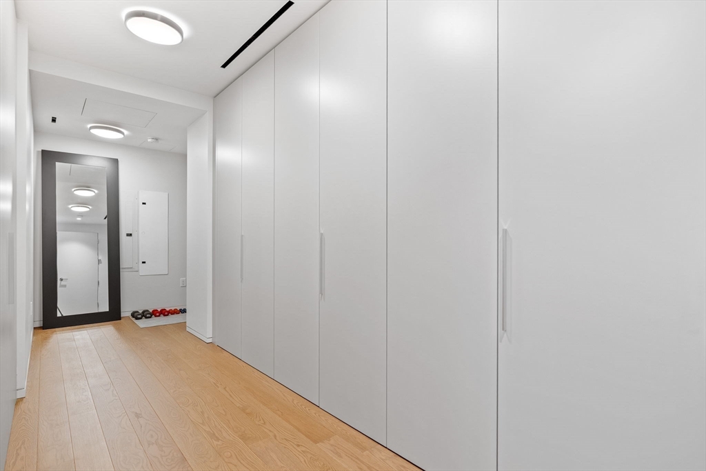 10 Farnsworth Street, Unit 3A Boston, MA 02210 - Photo 20 of 31 a view of a livingroom with wooden floor