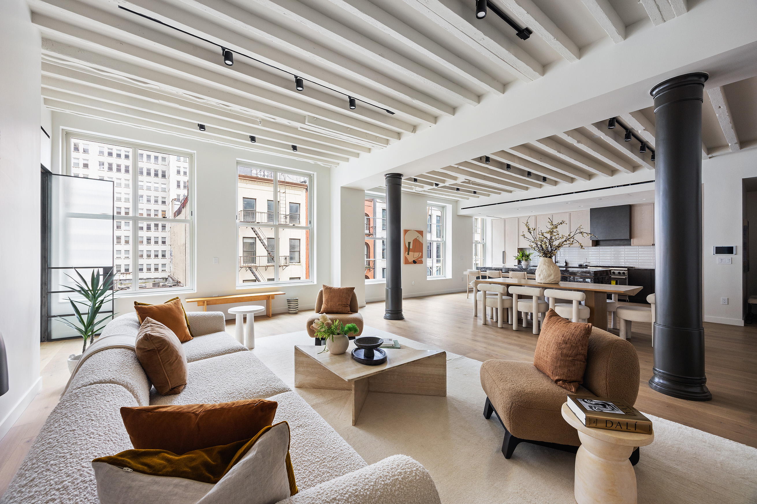 62 Reade Street, Unit 5 Manhattan, NY 10007 - Photo 3 of 21 a living room with furniture and a large window