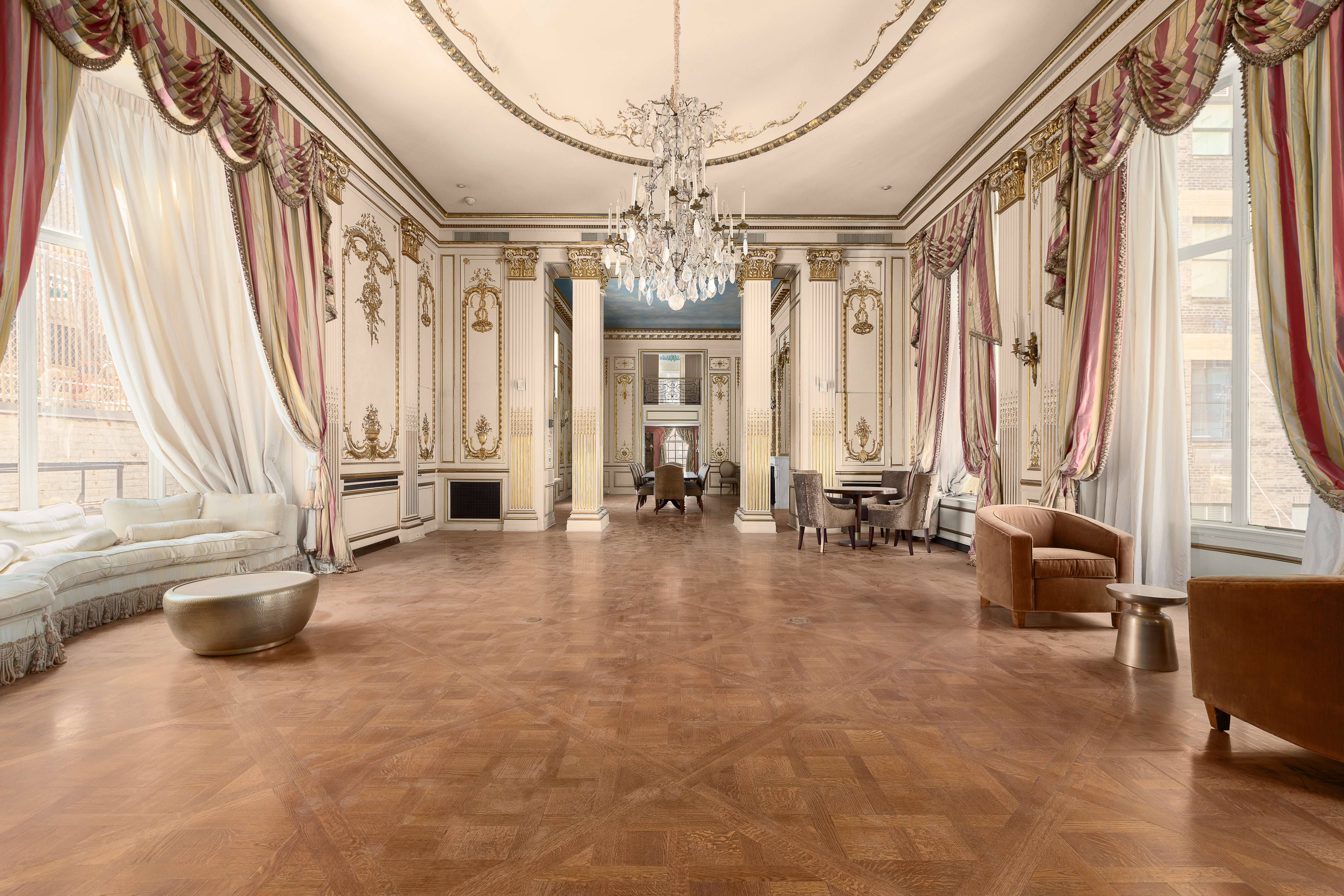 1 East 62nd Street, Unit PH Manhattan, NY 10065 - Photo 3 of 13 a view of an entryway with a chandelier