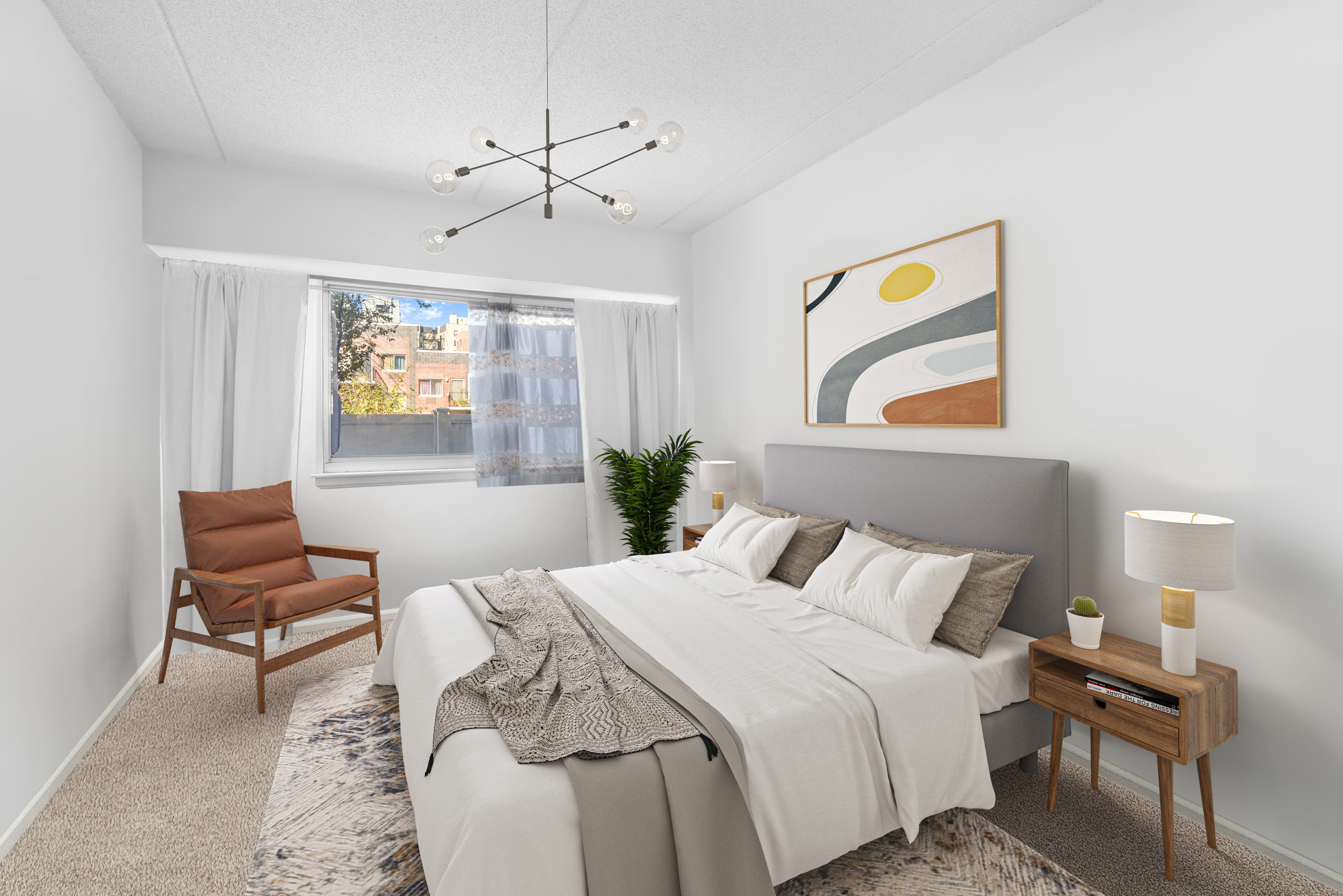 300 West 145th Street, Unit 1QQ Manhattan, NY 10039 - Photo 8 of 15 a bedroom with a bed and a chandelier