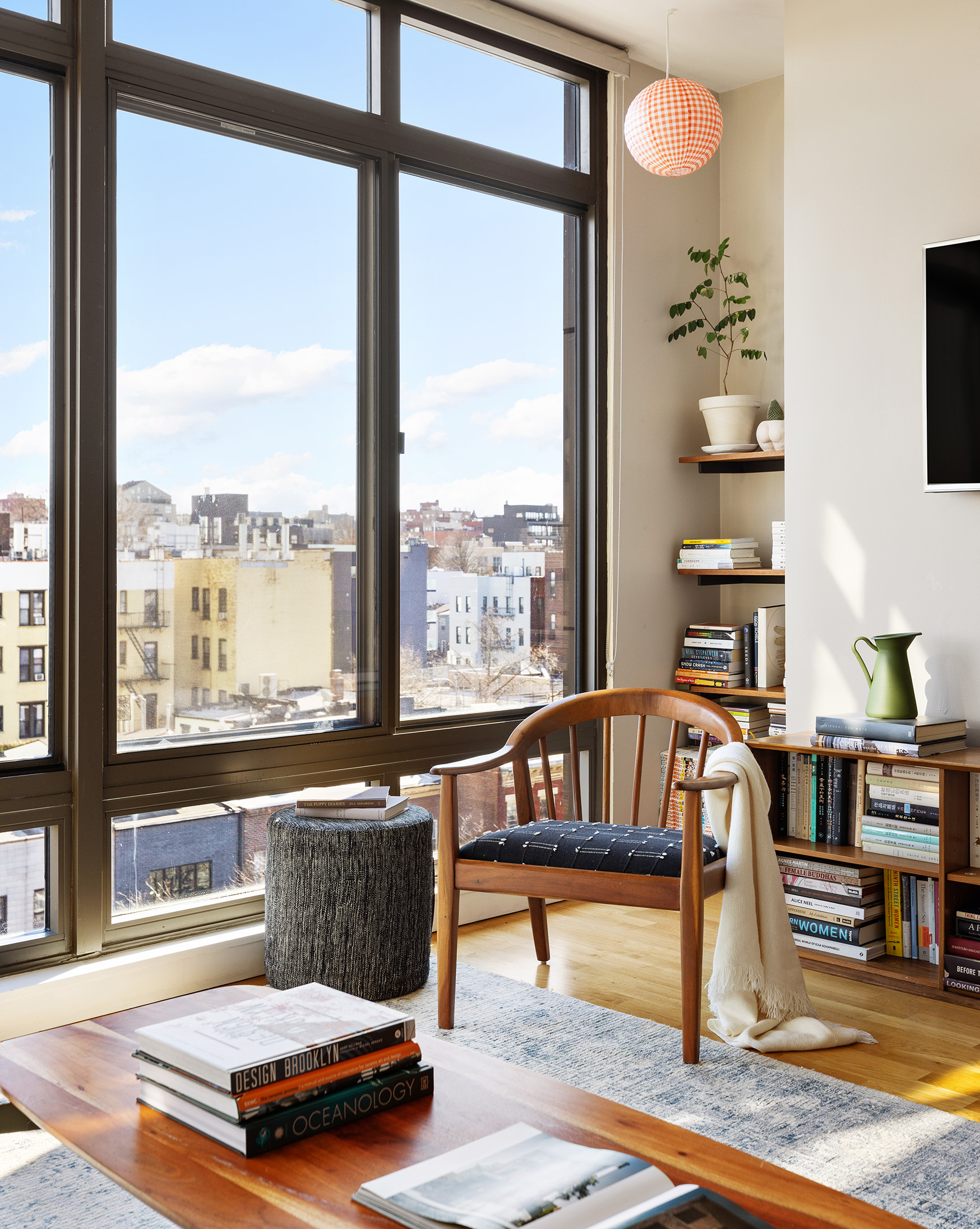 500 4th Avenue, Unit 7C Brooklyn, NY 11215 - Photo 2 of 12 a living room with furniture and a large window