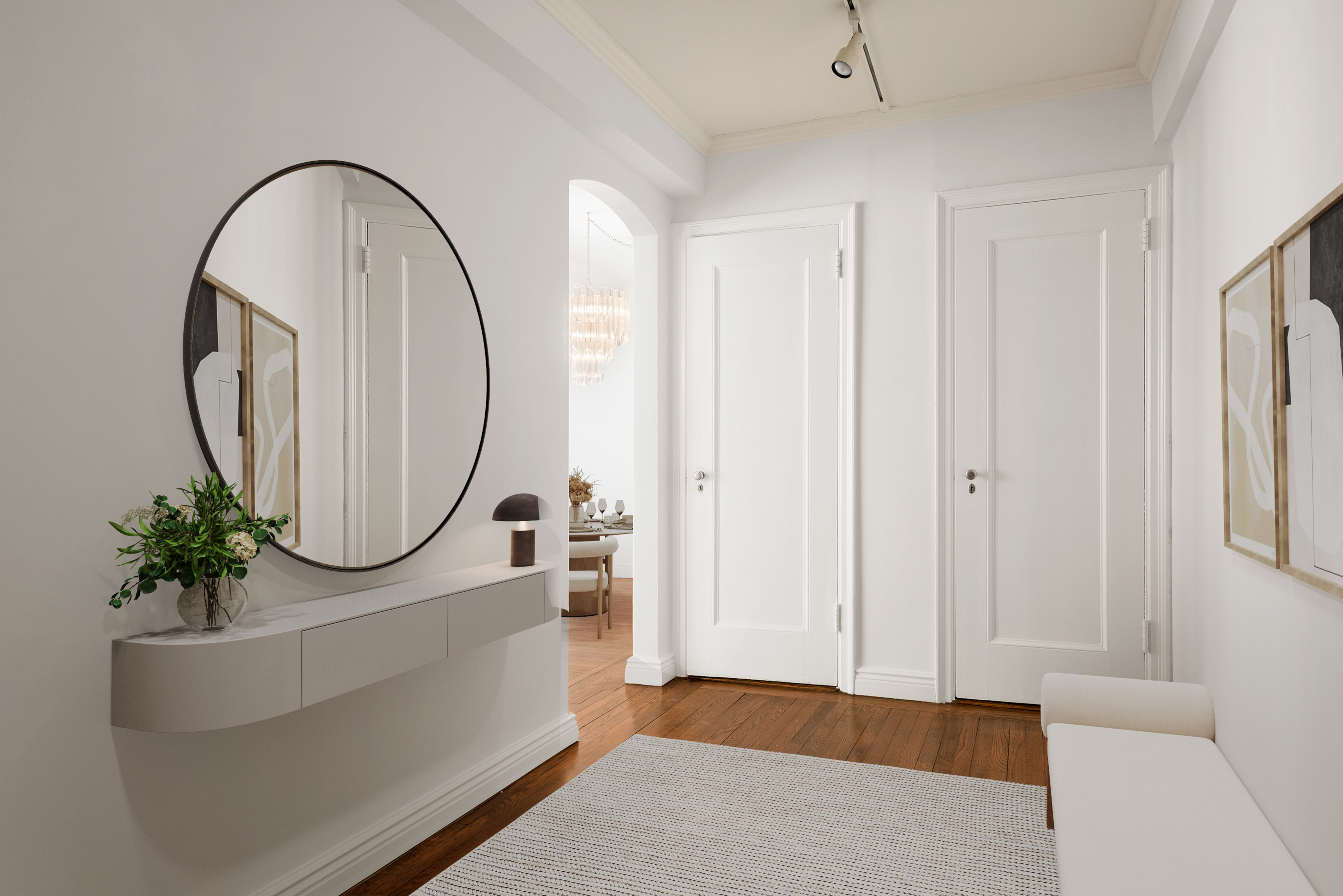 210 East 73rd Street, Unit 9EF Manhattan, NY 10021 - Photo 4 of 16 a front view of a house with garden