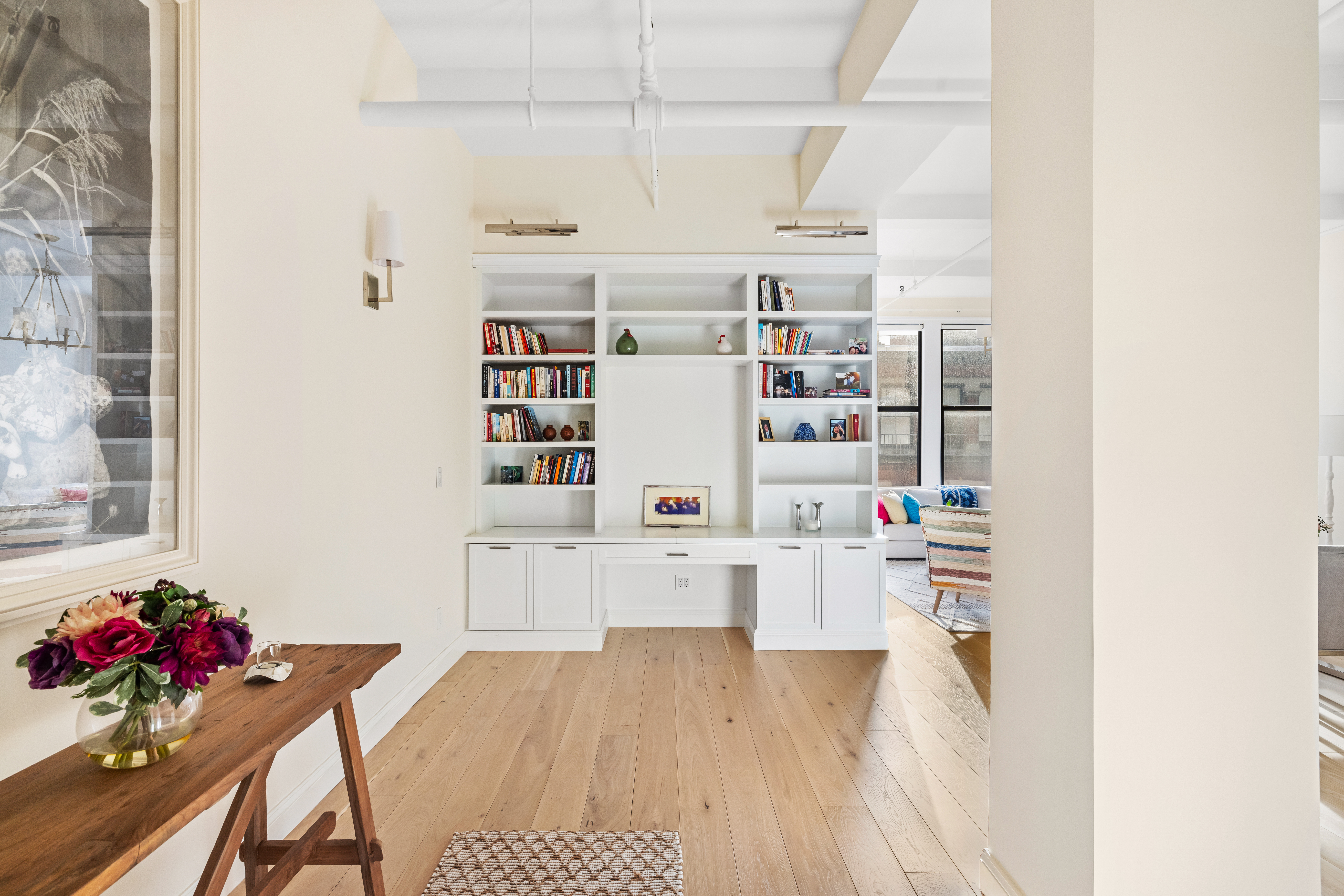 222 Park Avenue South, Unit 8D Manhattan, NY 10003 - Photo 5 of 9 a view of kitchen and utility room with wooden floor