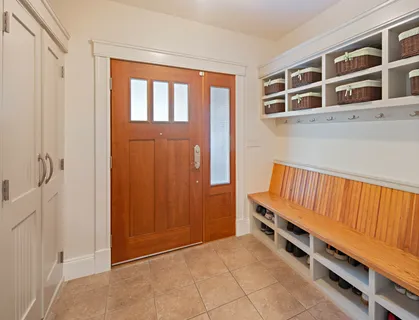 a view of wooden floor and windows in a room