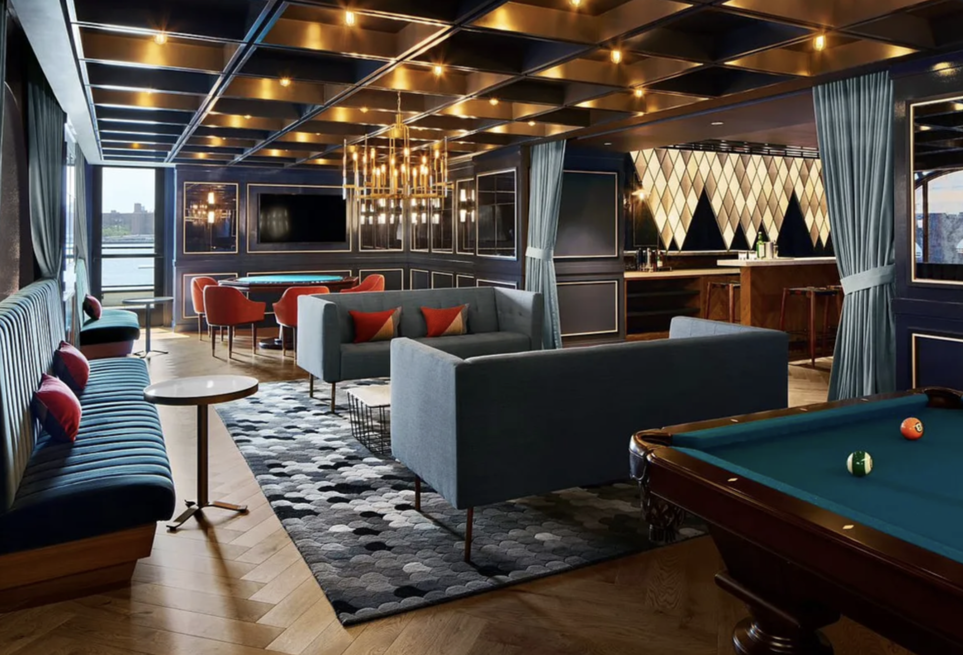 21 India Street, Unit 2101 Brooklyn, NY 11222 - Photo 18 of 22 a living room with patio furniture and a flat screen tv