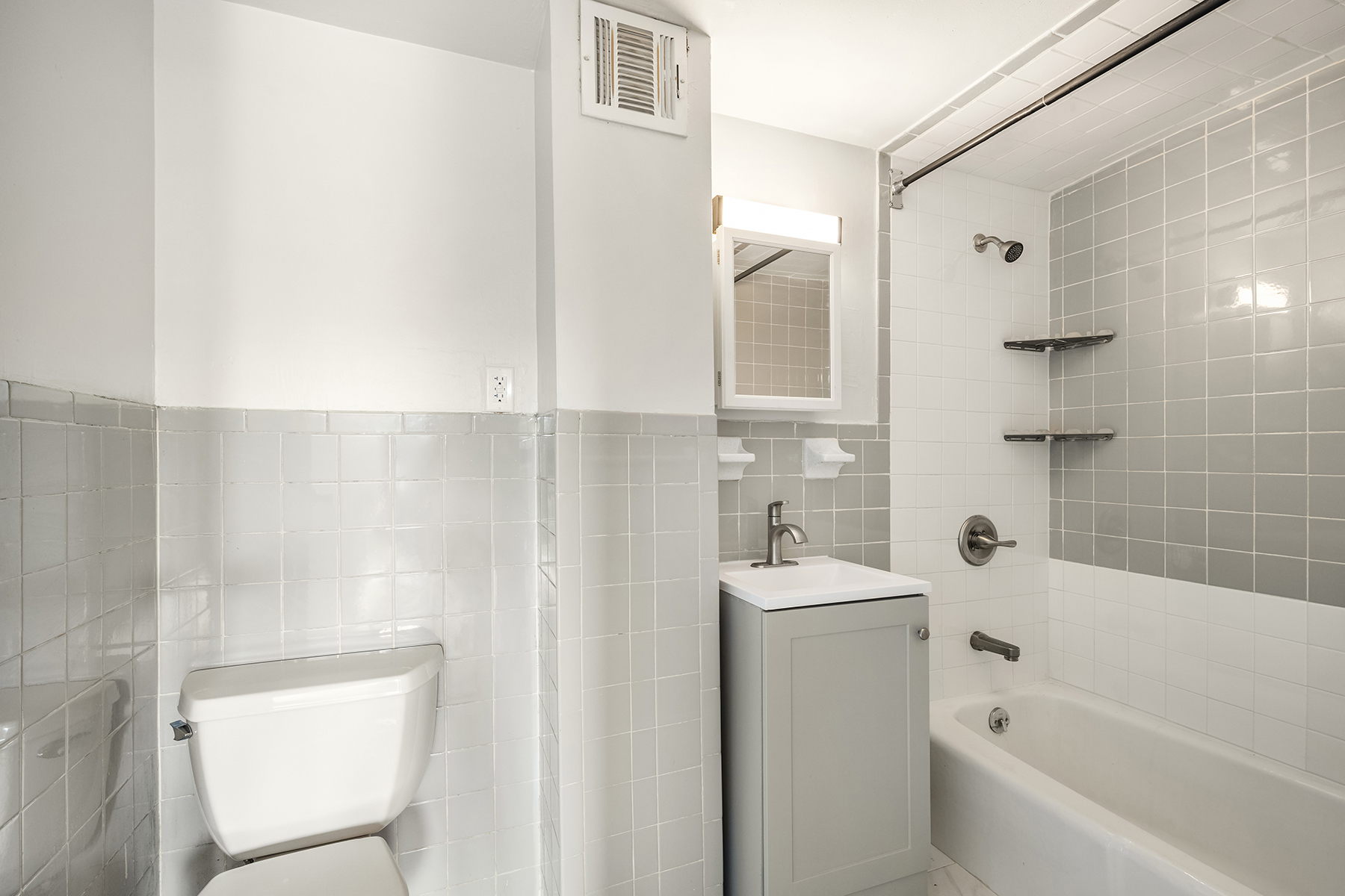 357 West 120th Street, Unit 3F Manhattan, NY 10027 - Photo 5 of 5 a bathroom with a bathtub sink and toilet