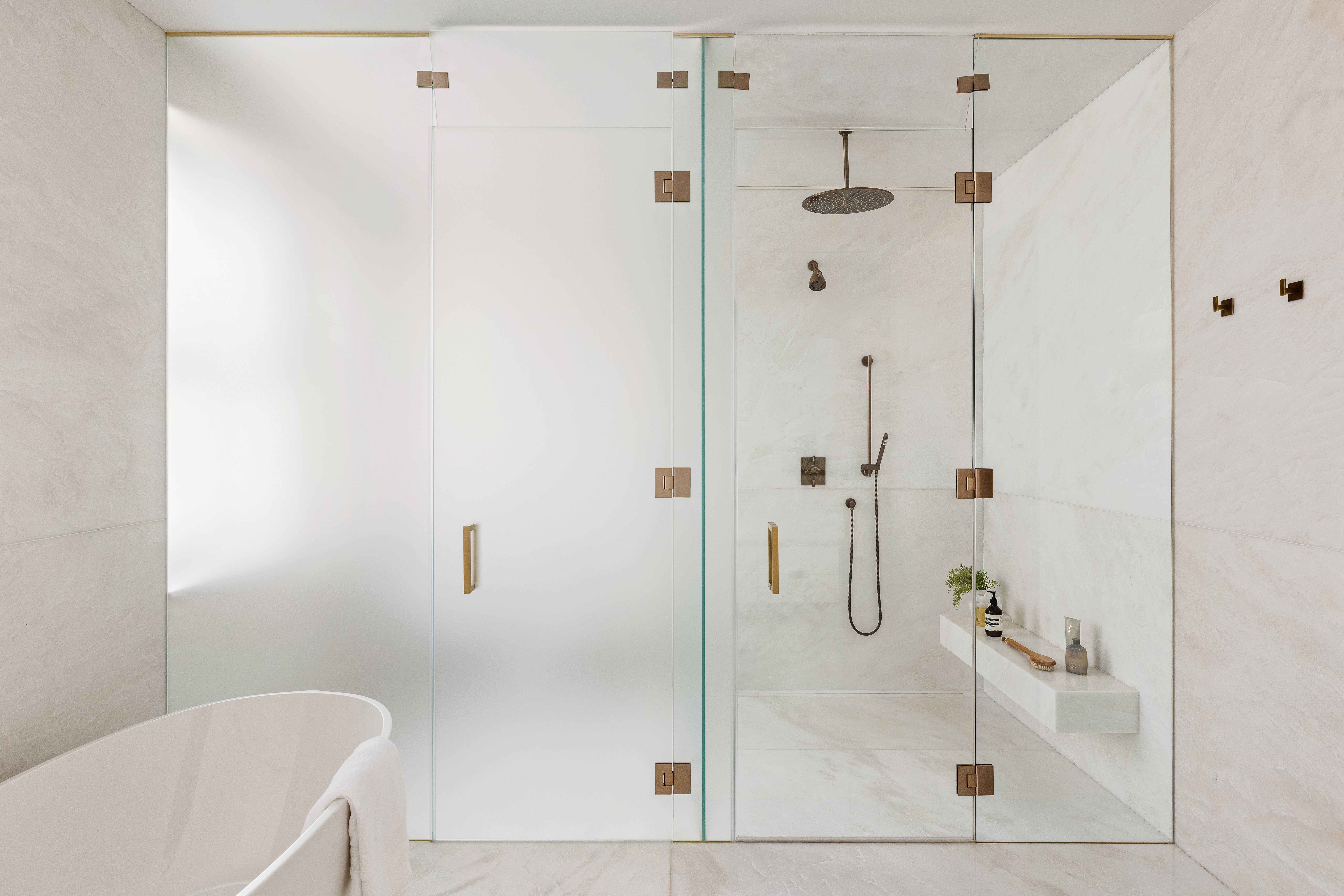 443 Greenwich Street, Unit PHD Manhattan, NY 10013 - Photo 21 of 32 a bathroom with a bathtub and a shower