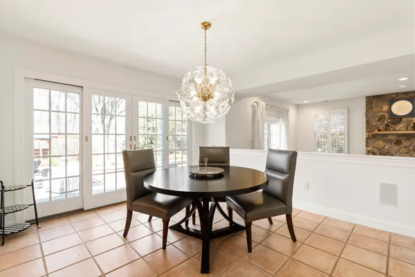 a spacious bedroom with a bed and a couch