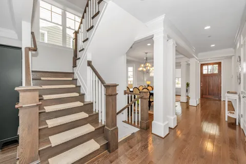 a spacious bathroom with a shower sink and mirror