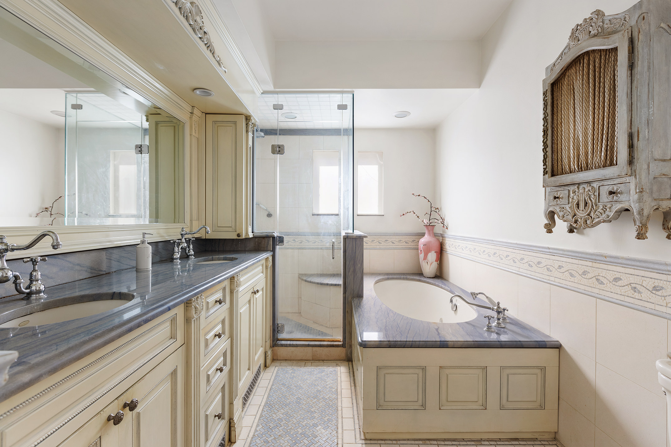 138 West 73rd Street Manhattan, NY 10023 - Photo 5 of 35 a bathroom with a sink and a mirror