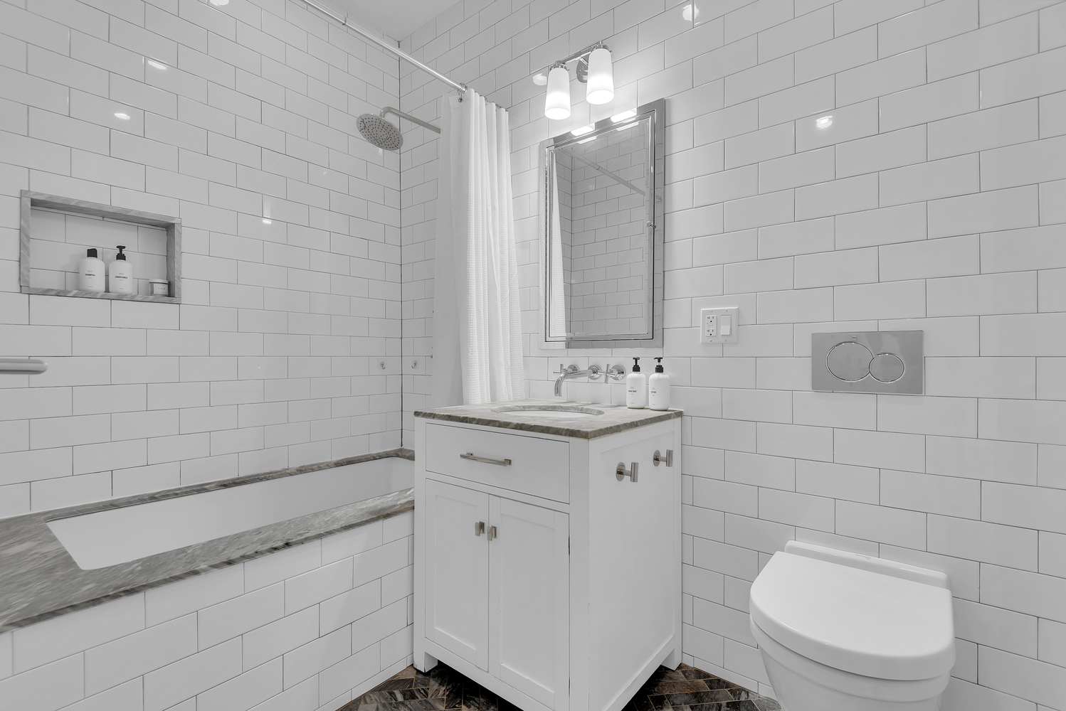 84 Lefferts Place, Unit 3B Brooklyn, NY 11238 - Photo 10 of 12 a bathroom with a granite countertop sink a toilet and shower