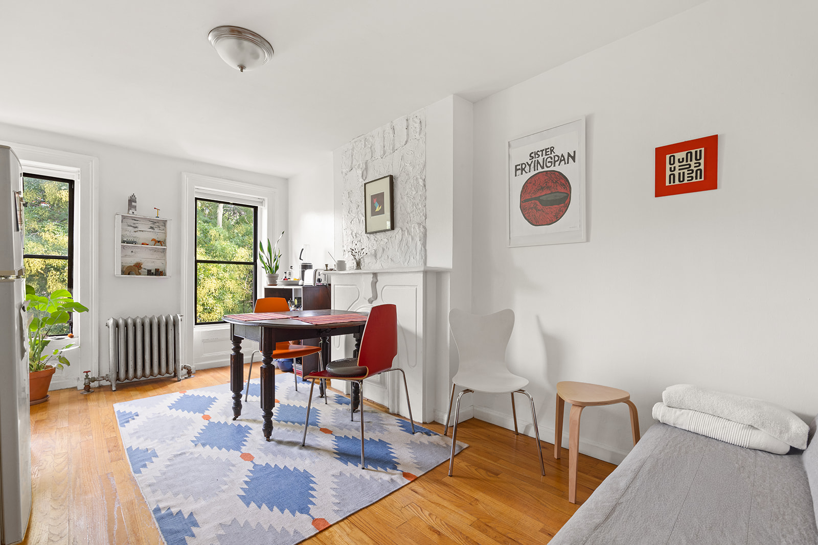 33 Park Place Brooklyn, NY 11217 - Photo 13 of 18 a living room with furniture and a wooden floor