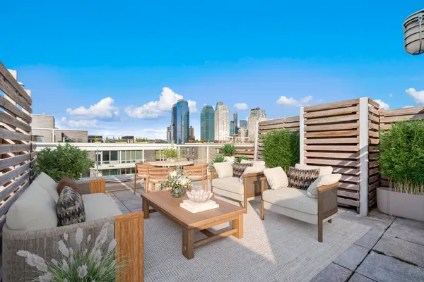 a view of a balcony with city view