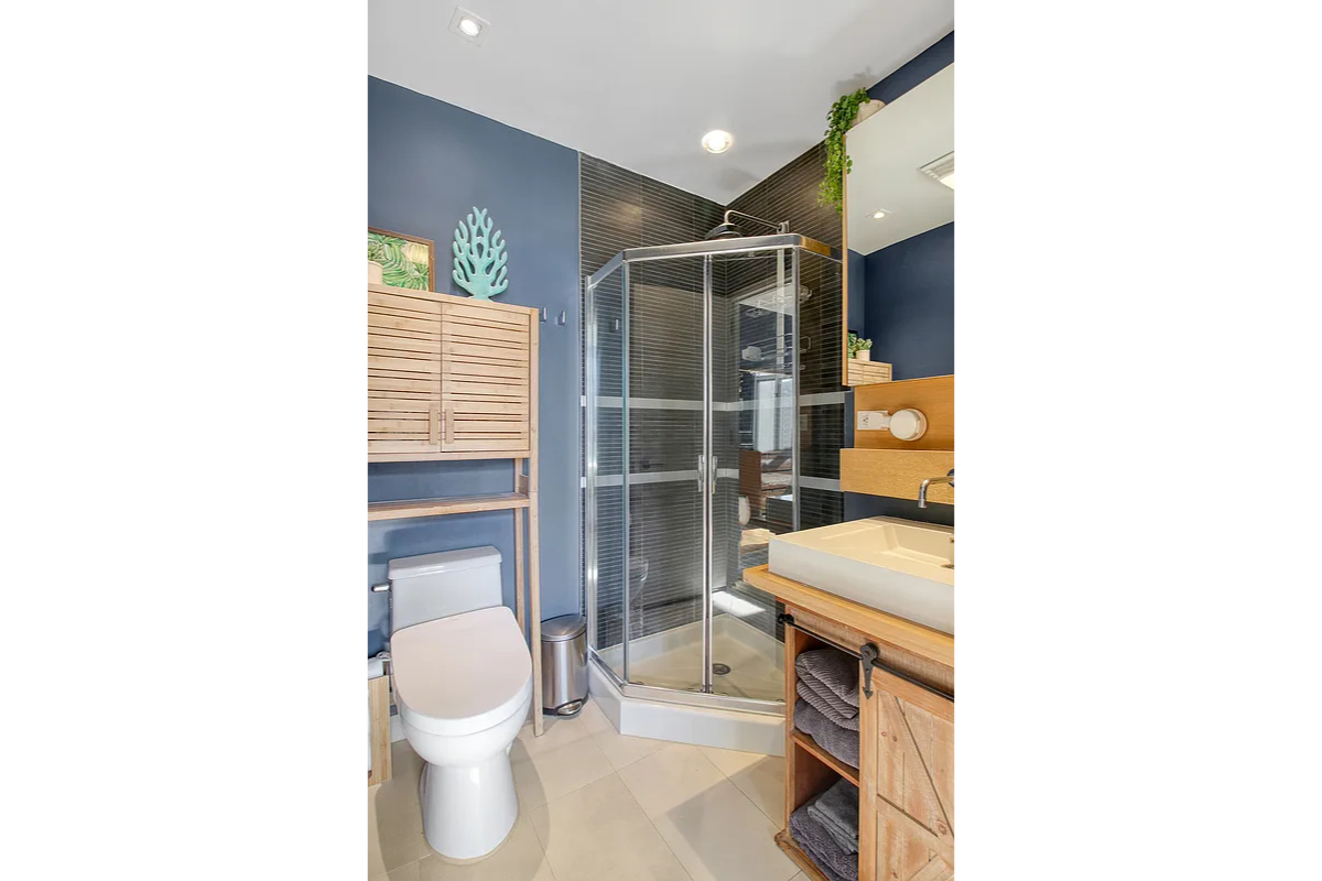 342 East 110th Street, Unit 5E Manhattan, NY 10029 - Photo 9 of 18 a bathroom with a toilet sink and a shower