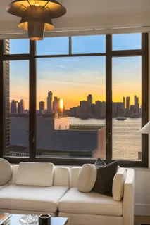 a view of roof deck with furniture