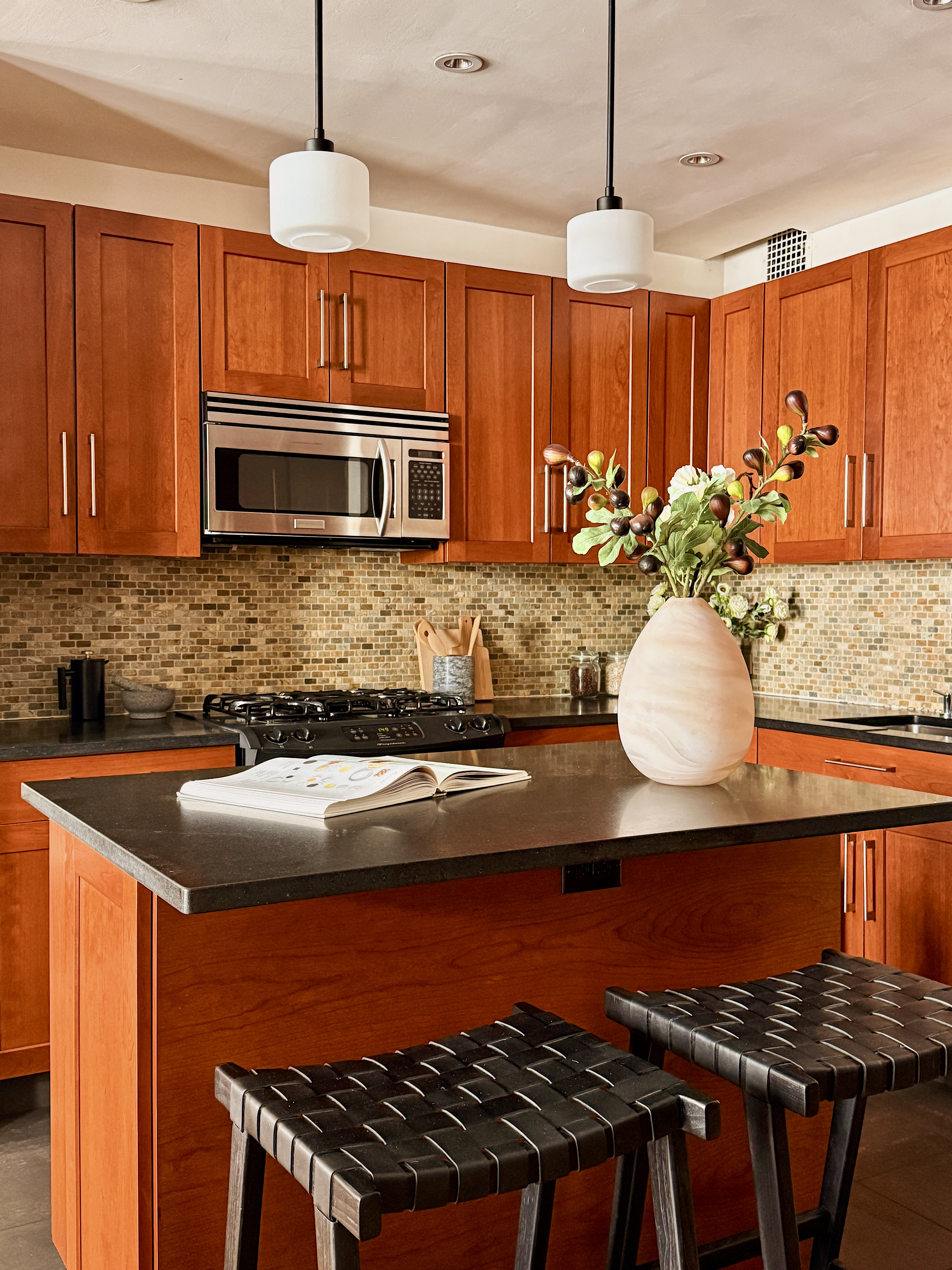 305 West 98th Street, Unit 4AN Manhattan, NY 10025 - Photo 4 of 10 a kitchen with stainless steel appliances granite countertop a stove a sink and a microwave