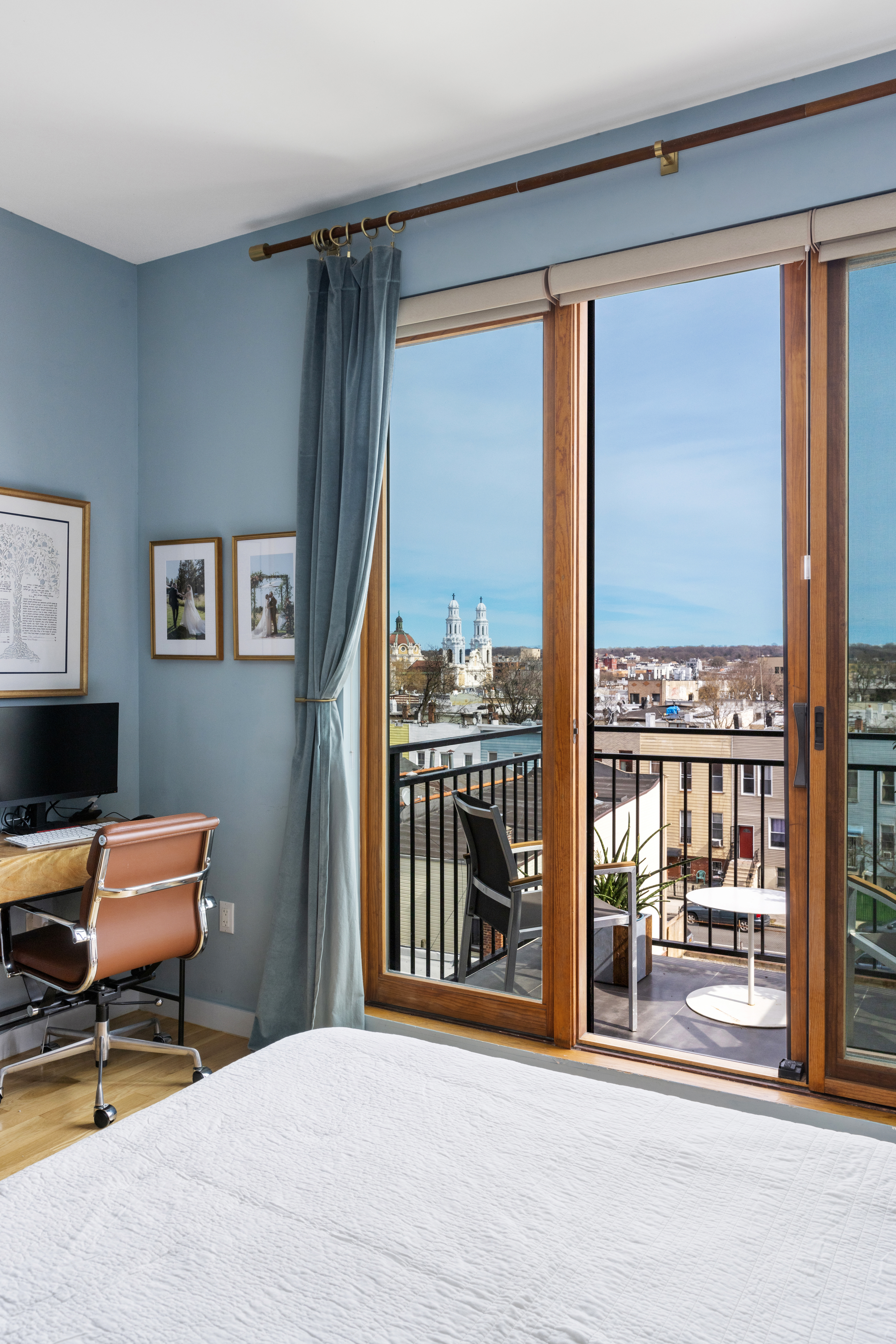 64 Stanhope Street, Unit PH Brooklyn, NY 11221 - Photo 7 of 13 a view of a livingroom with workspace and windows