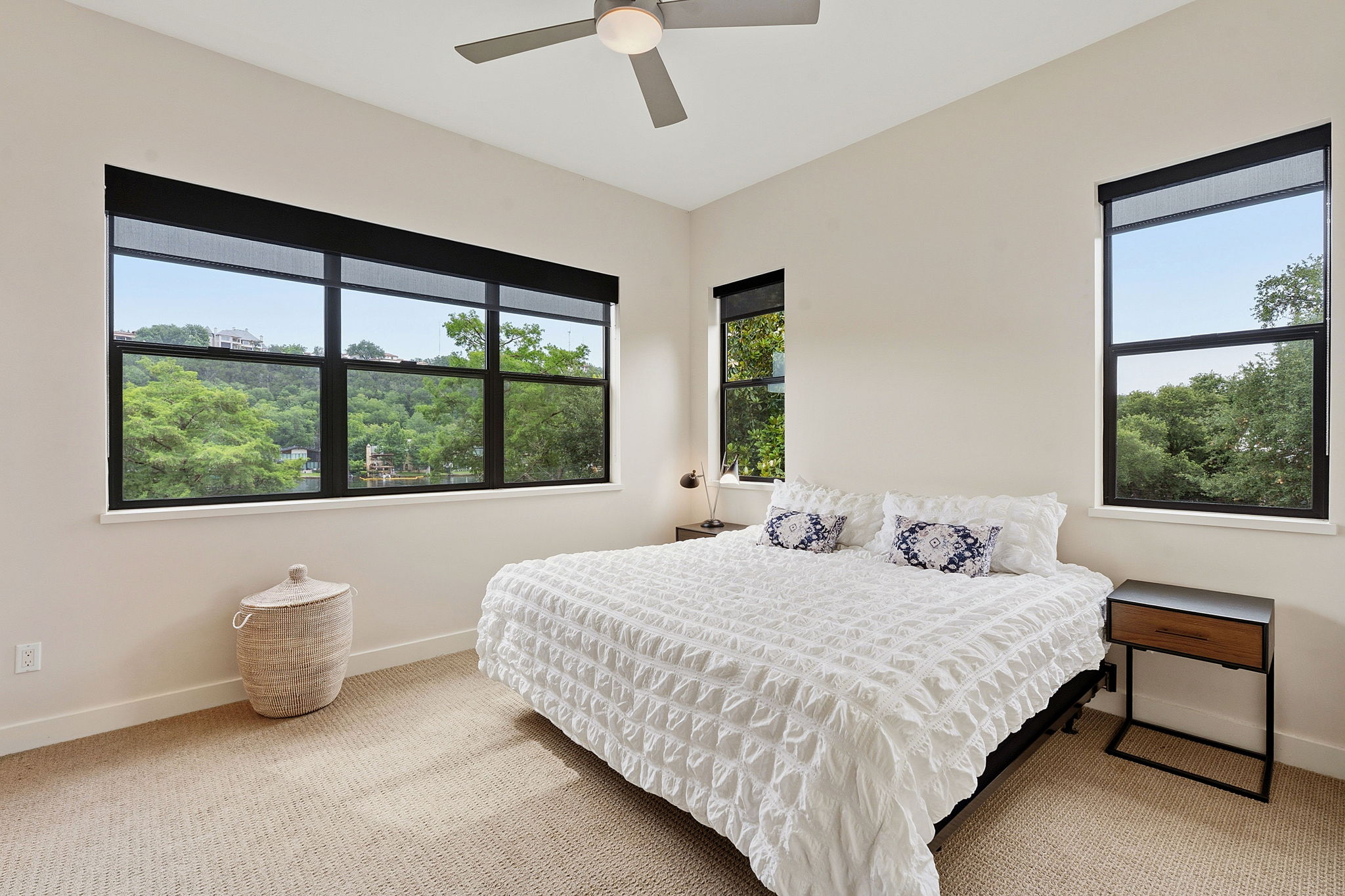 3605 Robbins Road Austin, TX 78730 - Photo 27 of 51 a bedroom with a bed and a large window