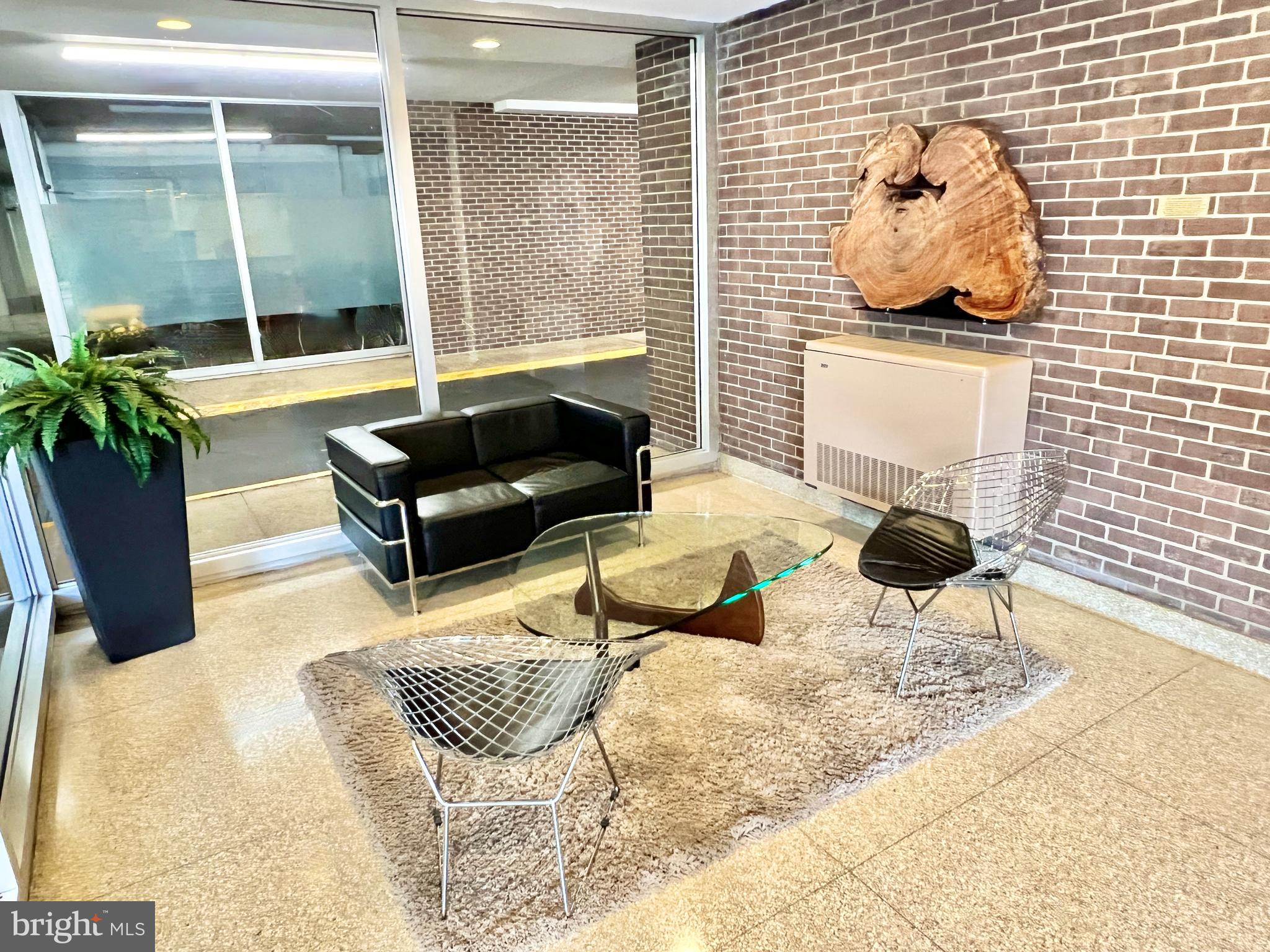 520 N Street Southwest, Unit S622 Washington, DC 20024 - Photo 16 of 25 a bedroom with furniture and a window