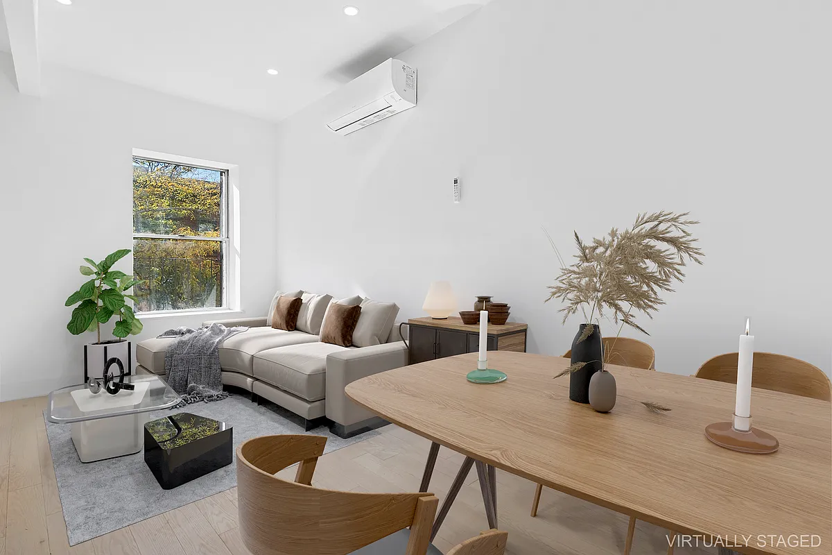 457 Bergen Street, Unit 2F Brooklyn, NY 11217 - Photo 2 of 12 a living room with furniture and flowers