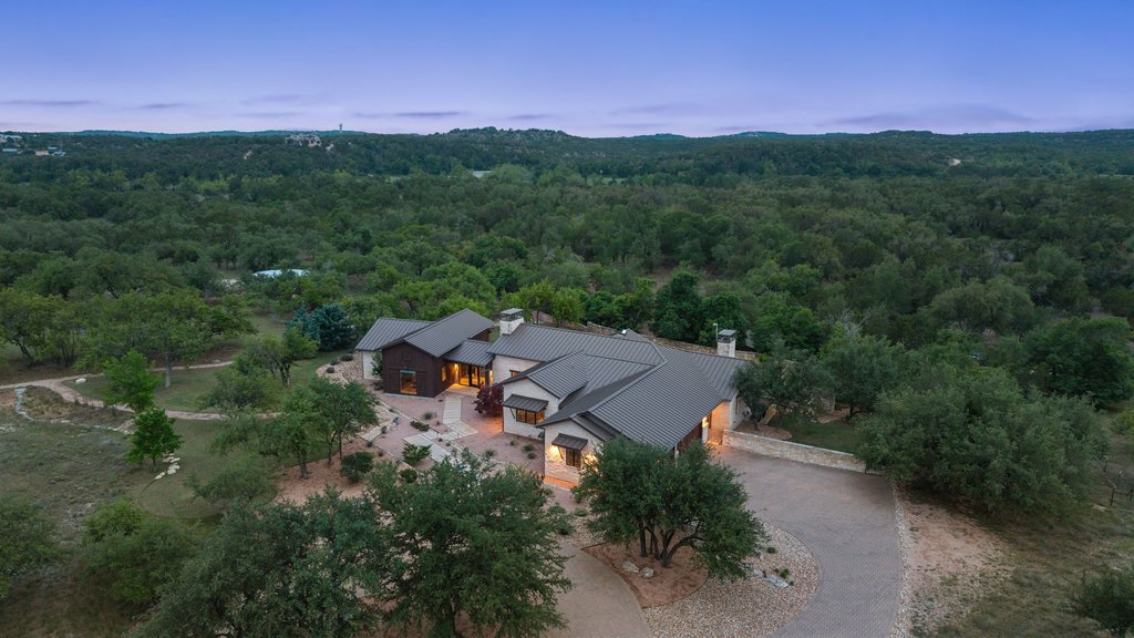 2560 Bell Springs Road Dripping Springs, TX 78620 - Photo 25 of 42 an aerial view of a house with a yard