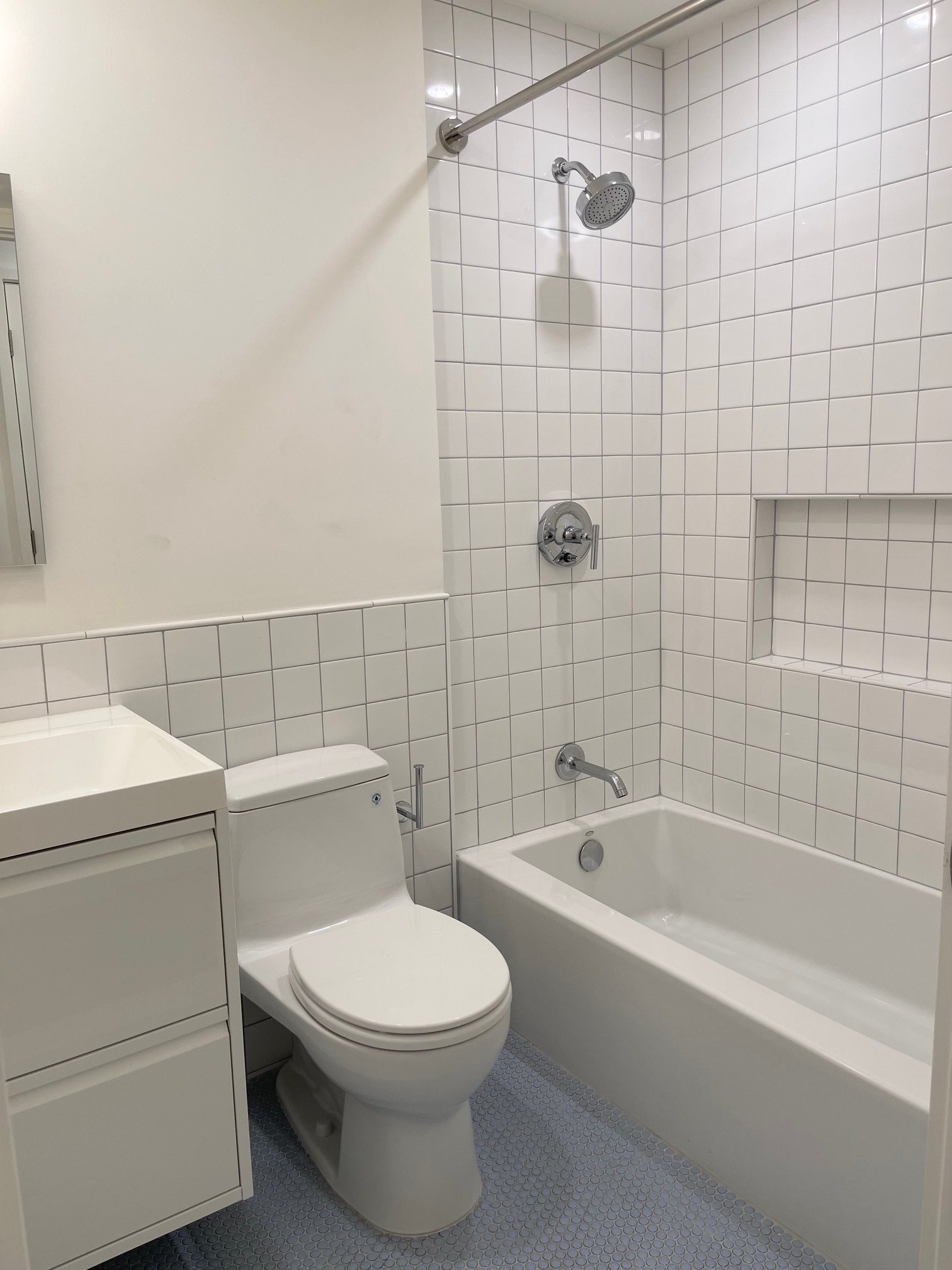 978 Bergen Street, Unit GARDEN Brooklyn, NY 11216 - Photo 11 of 15 a bathroom with a toilet and bathtub