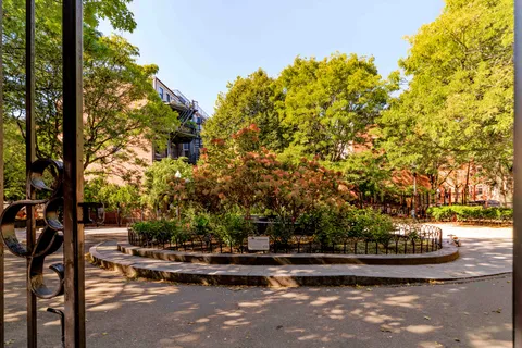 a view of yard with patio