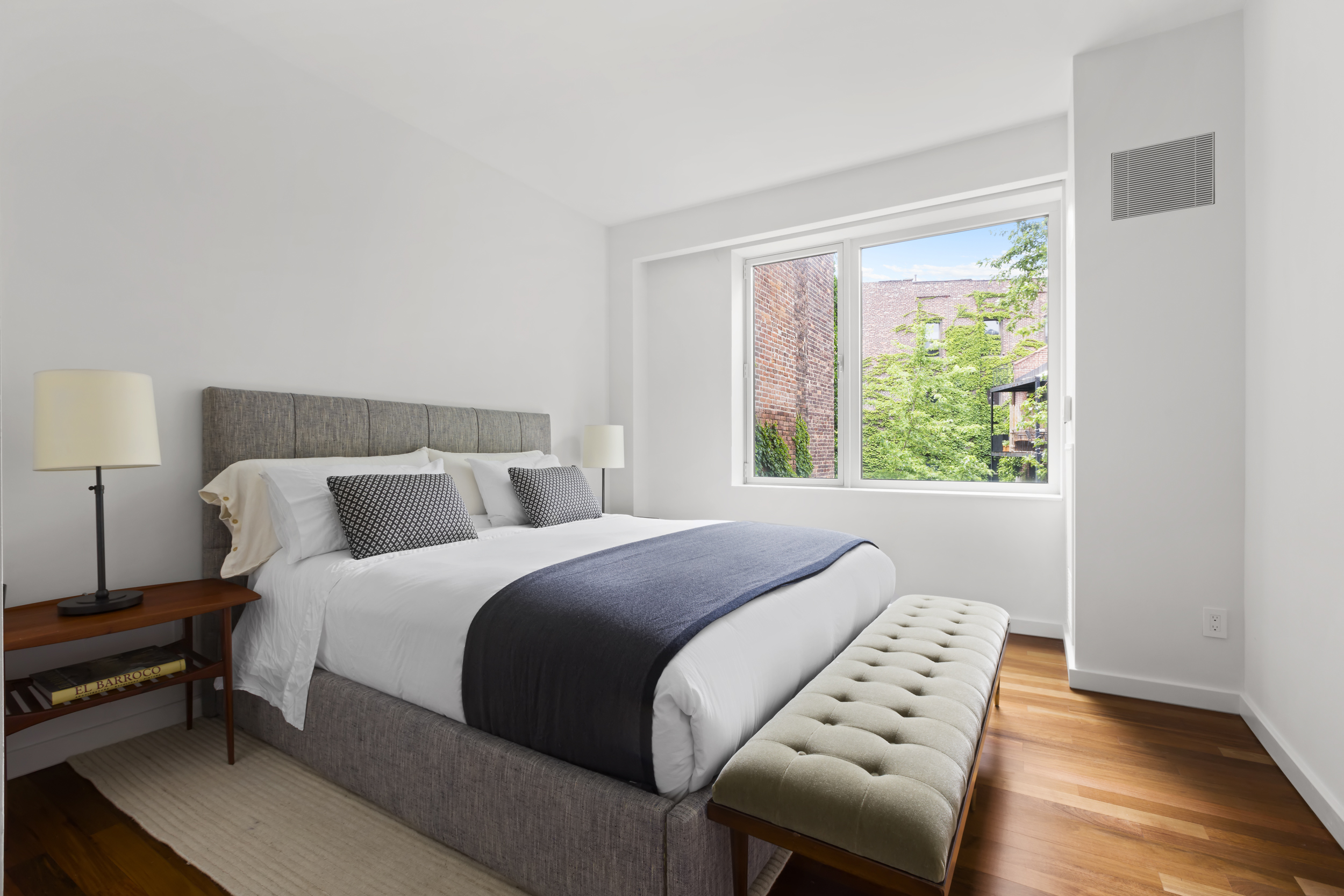 744 Greenwich Street, Unit 4 Manhattan, NY 10014 - Photo 28 of 34 a bedroom with a bed and a window