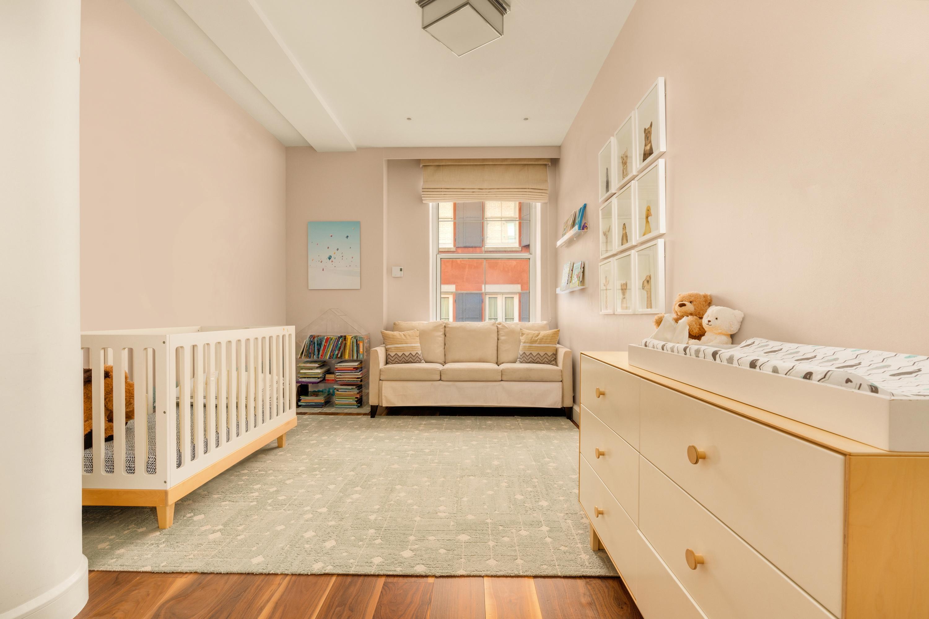 60 Beach Street, Unit 3C Manhattan, NY 10013 - Photo 8 of 12 a view of a bedroom with furniture and window