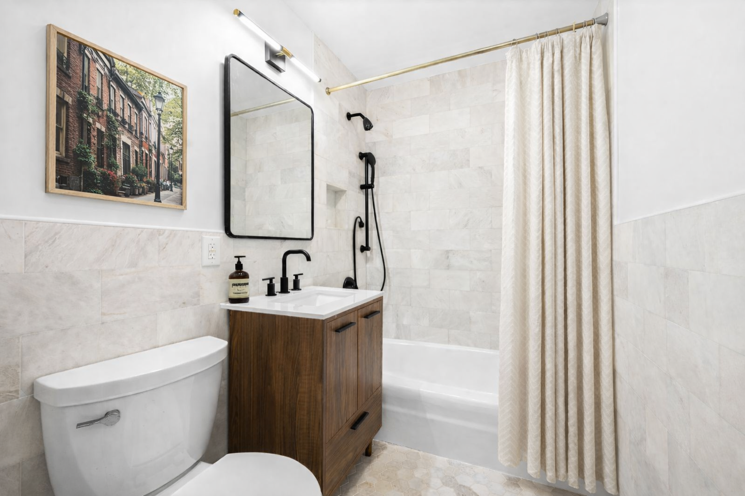 379 West Street, Unit 3B Manhattan, NY 10014 - Photo 4 of 7 a bathroom with a granite countertop sink a toilet and shower