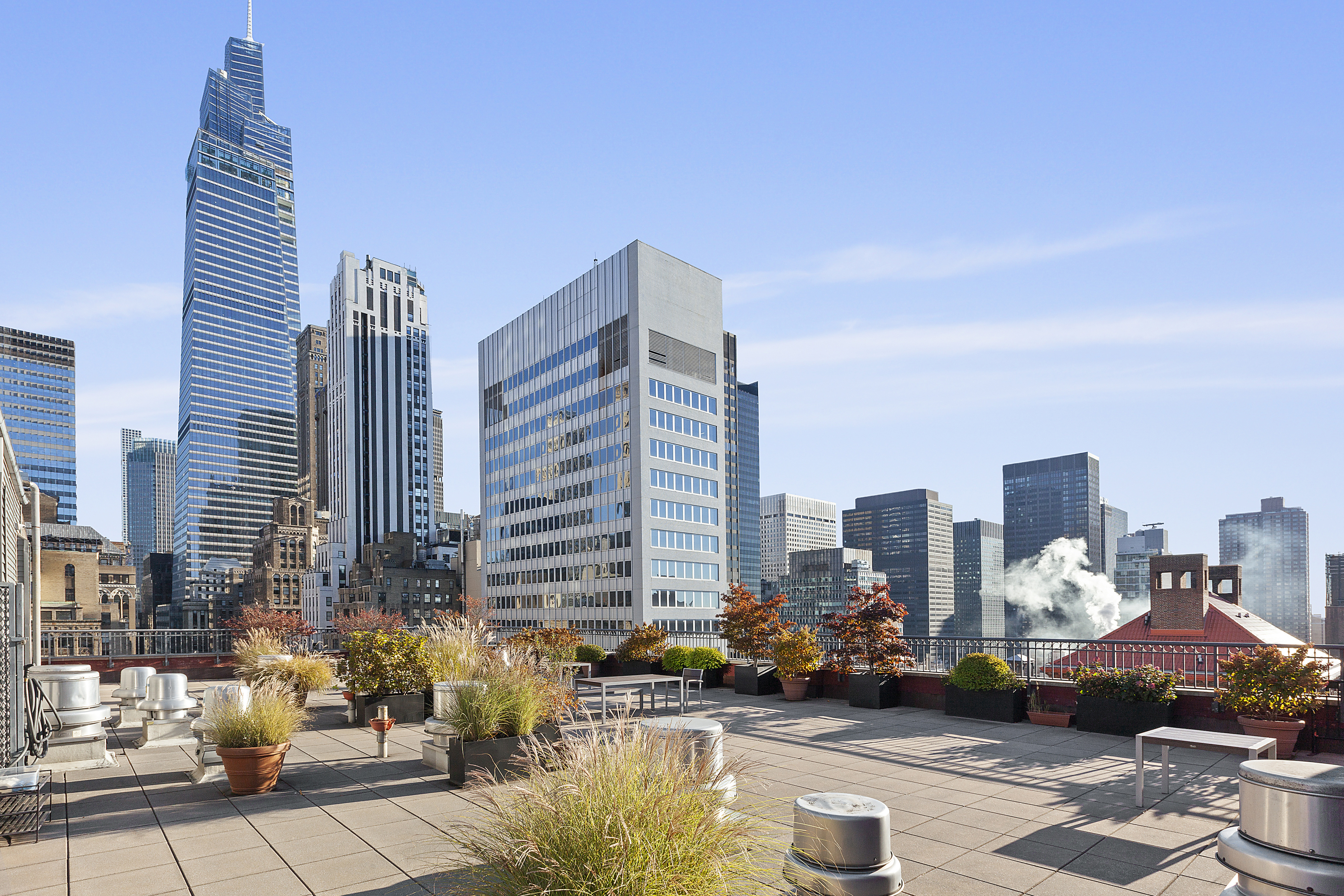 244 Madison Avenue, Unit PHE Manhattan, NY 10016 - Photo 12 of 20 a city view with tall buildings